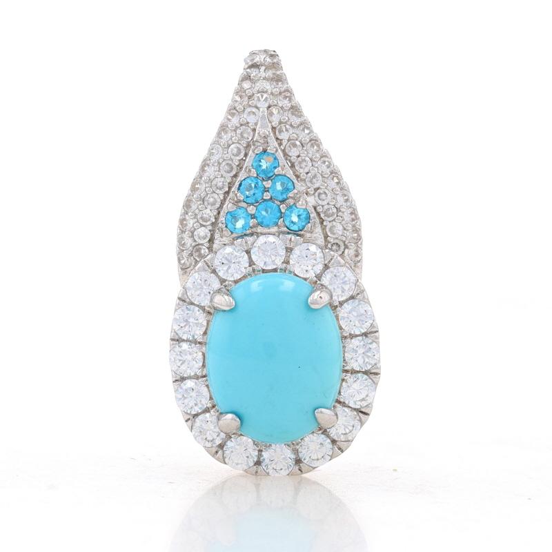 Metal Content: Sterling Silver

Stone Information
Natural Turquoise
Treatment: Routinely Enhanced
Color: Blue

Natural Apatite
Treatment: Heating
Color: Blue

Natural White Topaz

Style: Cluster Halo

Measurements
Tall: 1 1/32