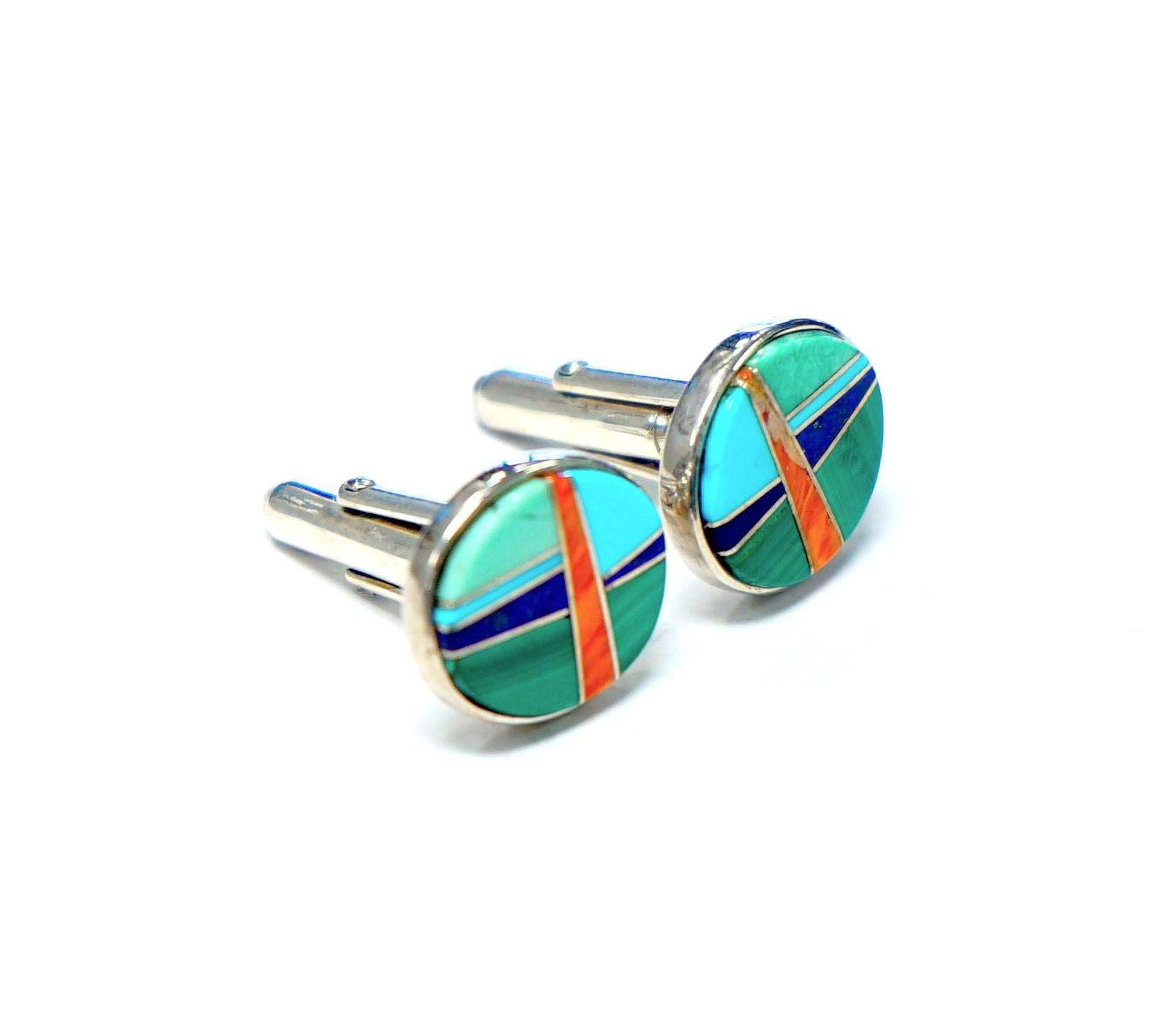 With all of the beautiful colors you associate with the Southwest!  These sterling silver cufflinks are stamped TSF, Sterling. 