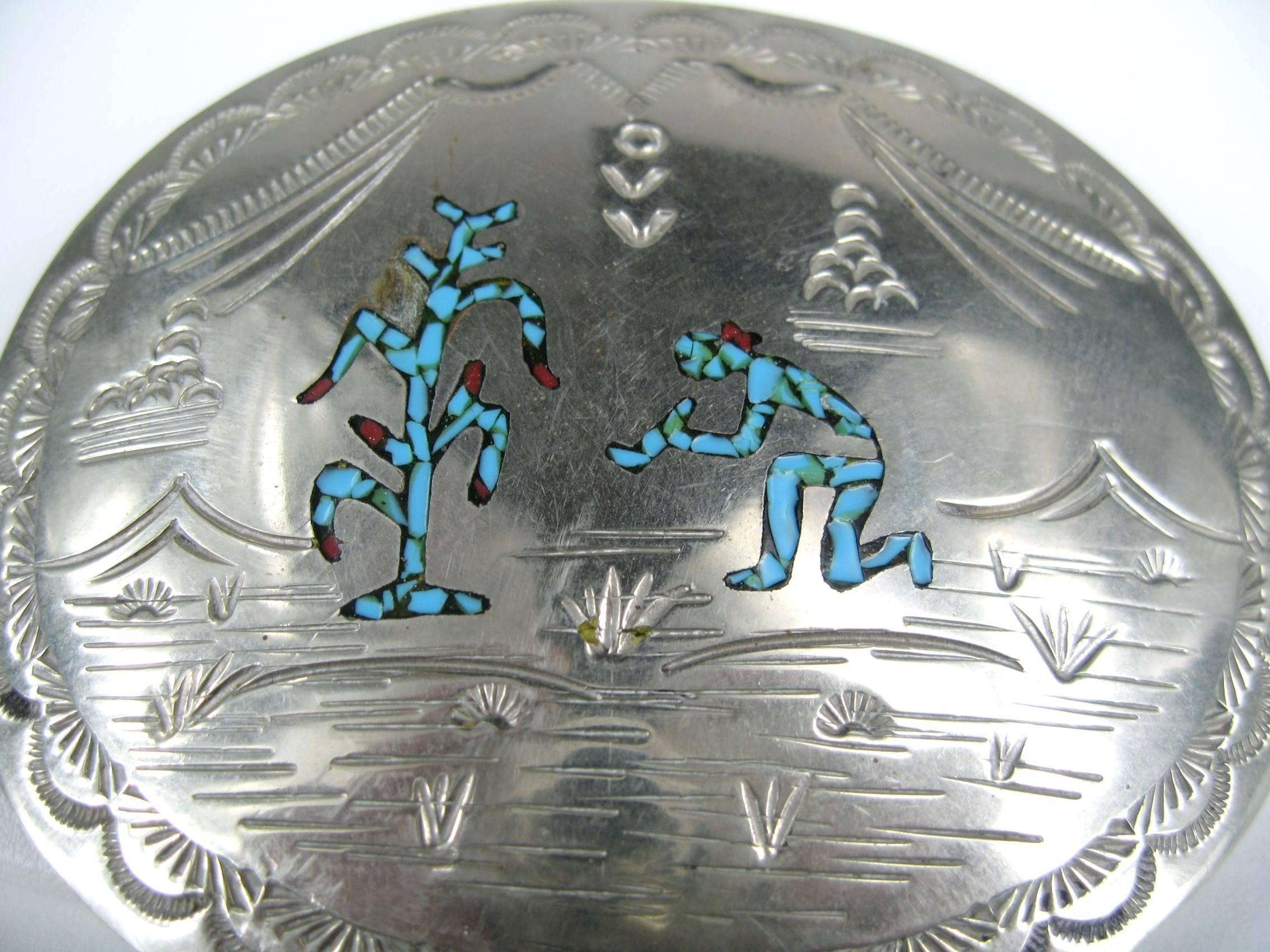 Wilson & Carolyn Begay Sterling silver Turquoise & Coral inlaid belt buckle. Depicting a cactus tree and a man. Measuring 2.67