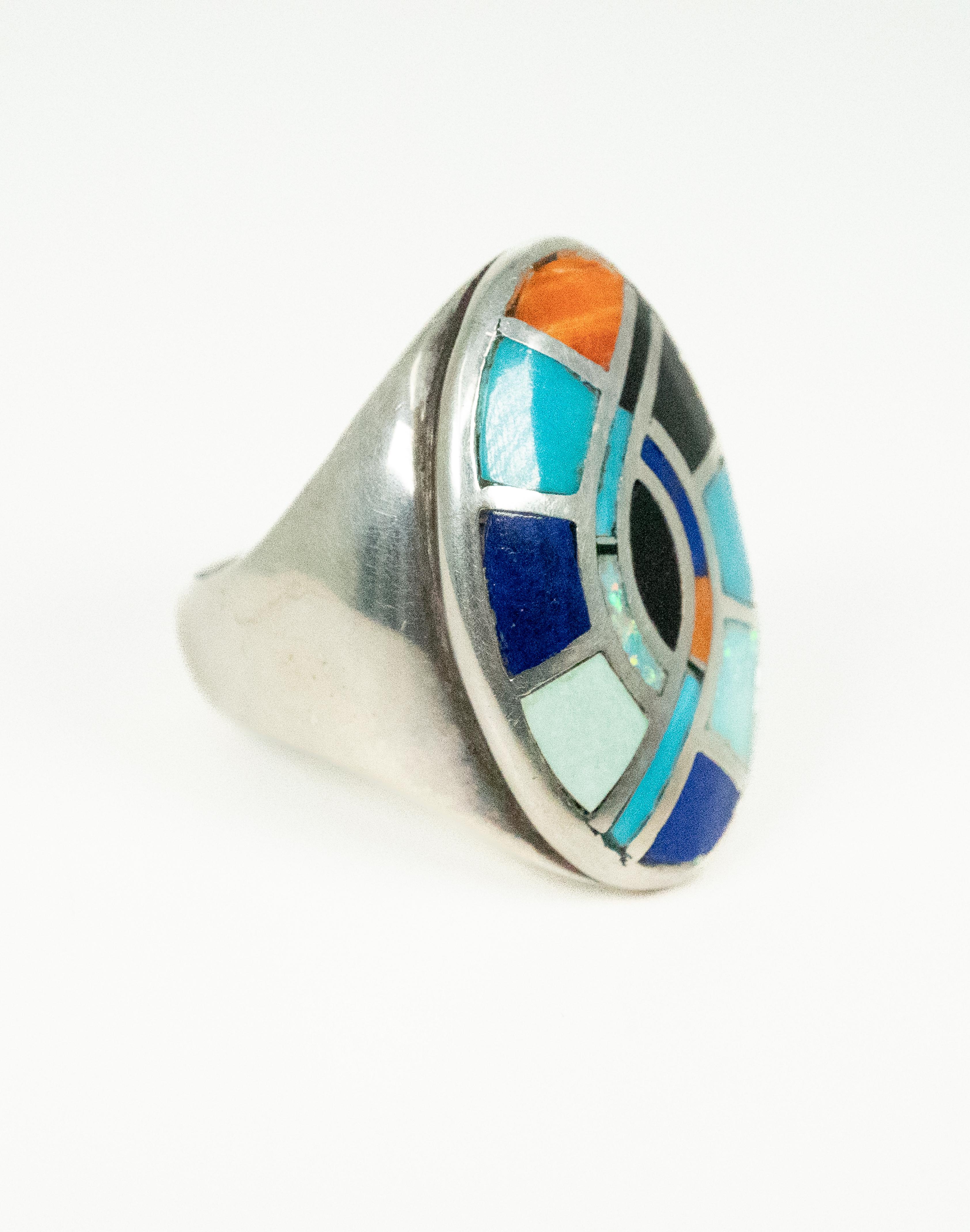 Handmade with beautiful inlays of turquoise, opal, lapis lazuli, onyx  and coral..... this ring is a Stunner!  