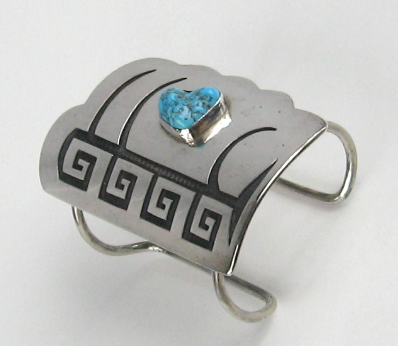 This is a Stunning early Hopi Cuff Bracelet. It is Hallmarked inside cuff. Large Turquoise stone. Double ring cuff.  Measuring 3.50