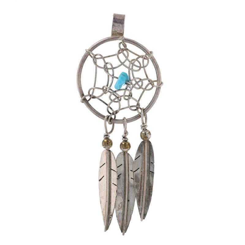 Design: Southwestern

Metal Content: 925 Sterling Silver

Stone Information

Natural Turquoise
Treatment: Routinely Enhanced
Color: Blue

Theme: Dream Catcher

Measurements

Tall (from stationary bail): 1 15/16