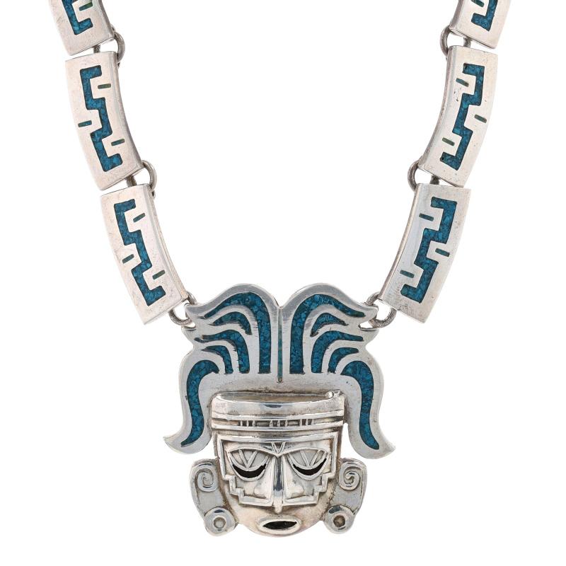 Era: Vintage

Metal Content: 925 Sterling Silver

Stone Information

Natural Turquoise
Treatment: Routinely Enhanced
Cut: Mosaic
Color: Blue

Necklace Style: Link
Fastening Type: Tab Box Clasp
Theme: Mask

Measurements

Item 1: Attached