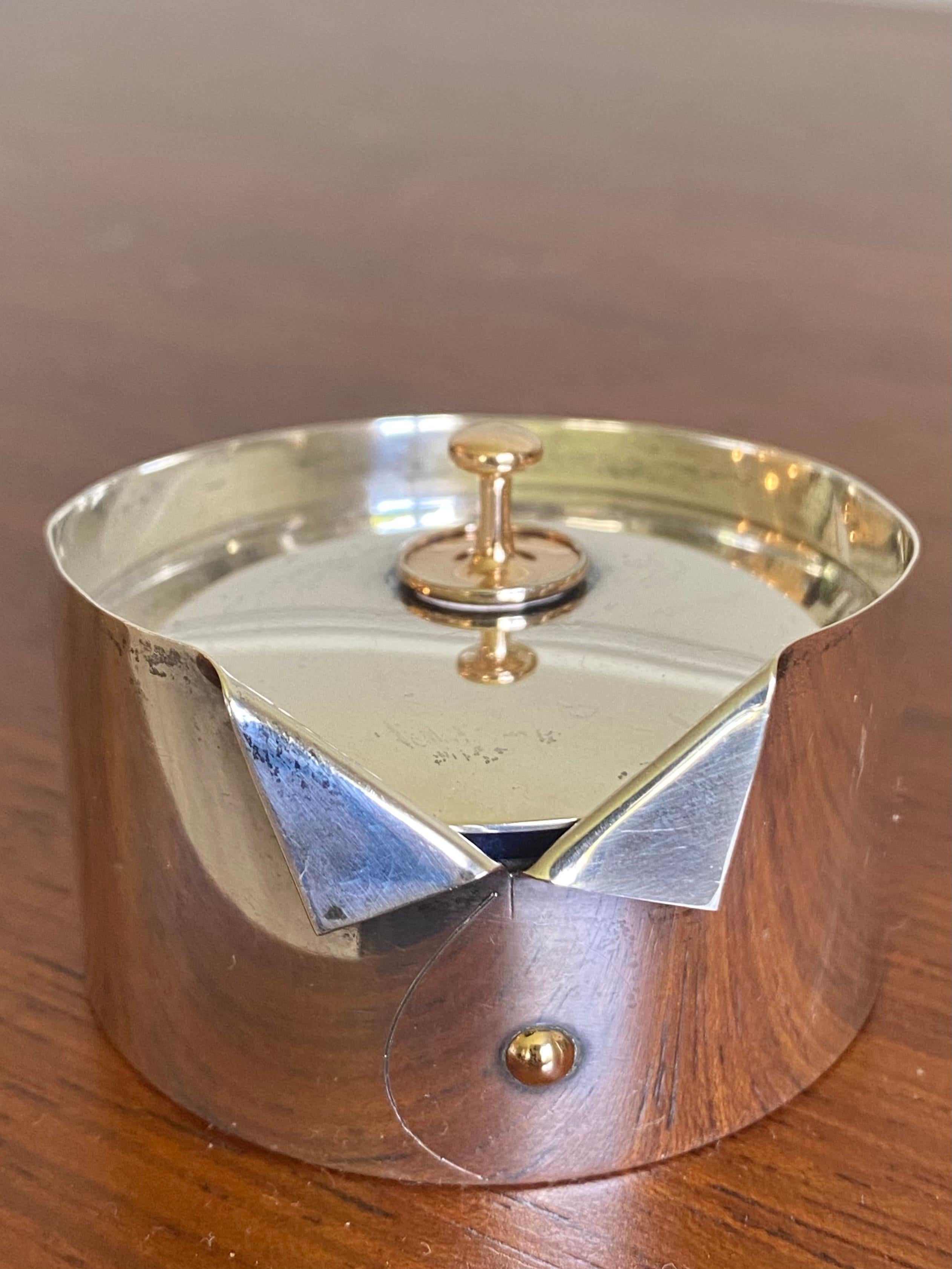 Sterling silver stud box in the form of a folded shirt collar with a gold-washed 