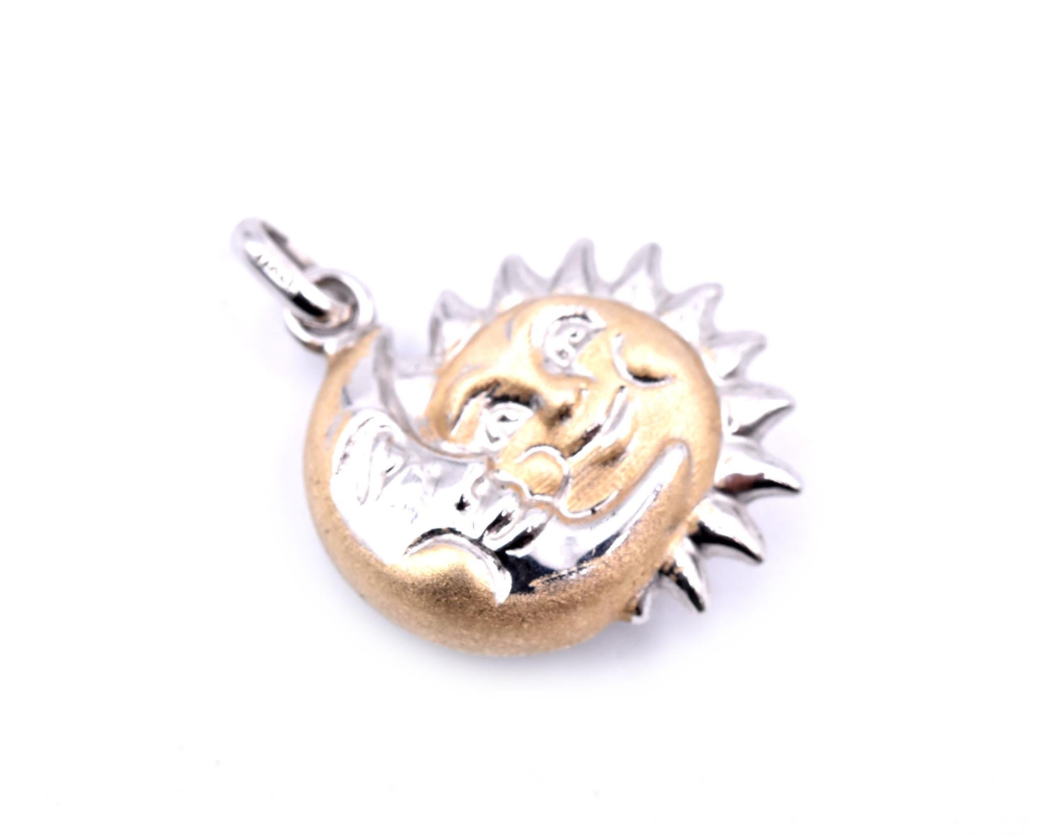 Designer: custom design
Material: sterling silver two-tone
Dimensions: pendant is ¼-inch and 20.24mm wide
Weight: 2.30 grams