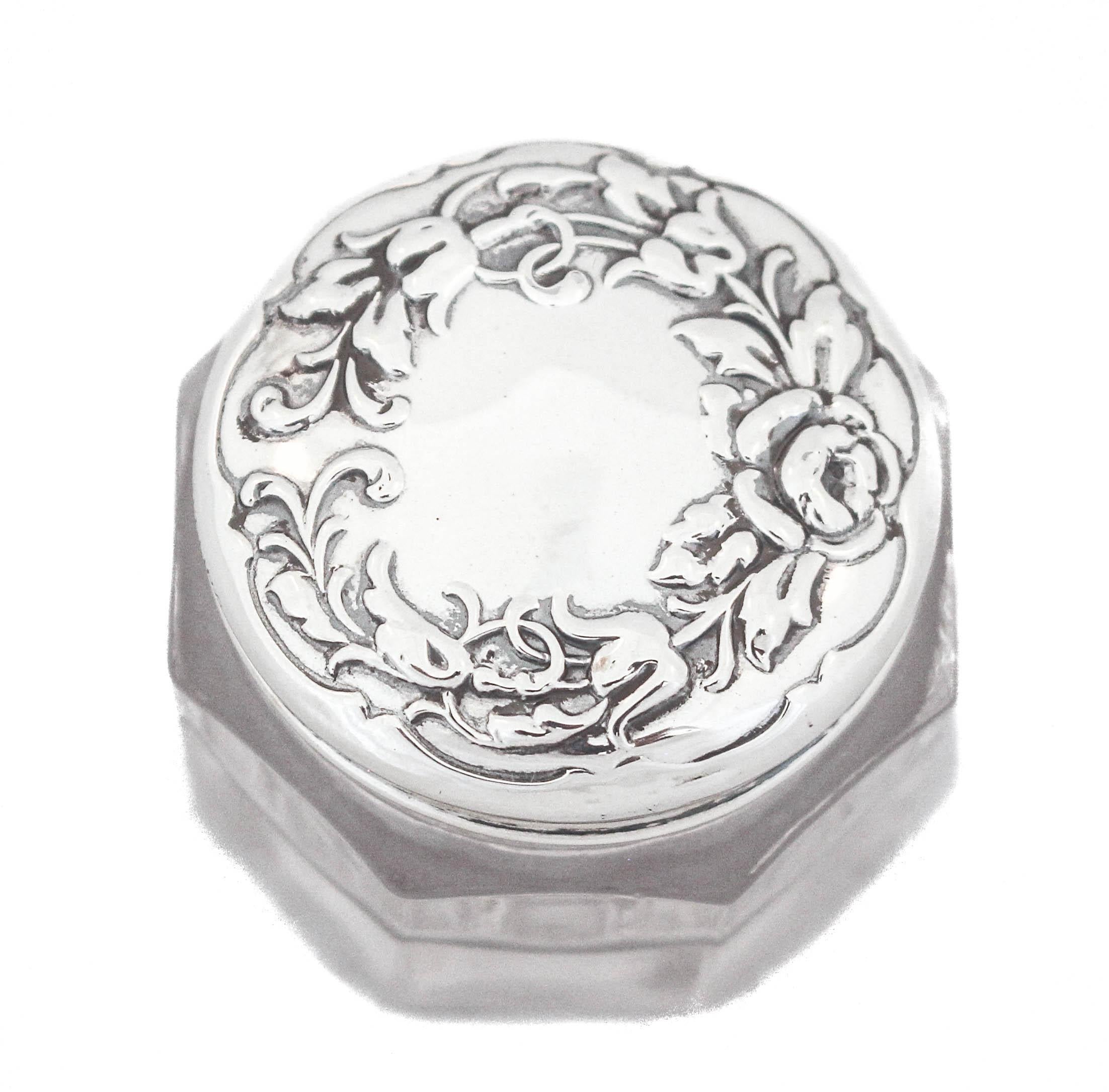 Being offered is an Art Nouveau sterling silver and crystal vanity jar.  Very popular in Victorian times and into the twentieth century, these jars were used for travel by women of means.  These days (of course they can still be used) but more often