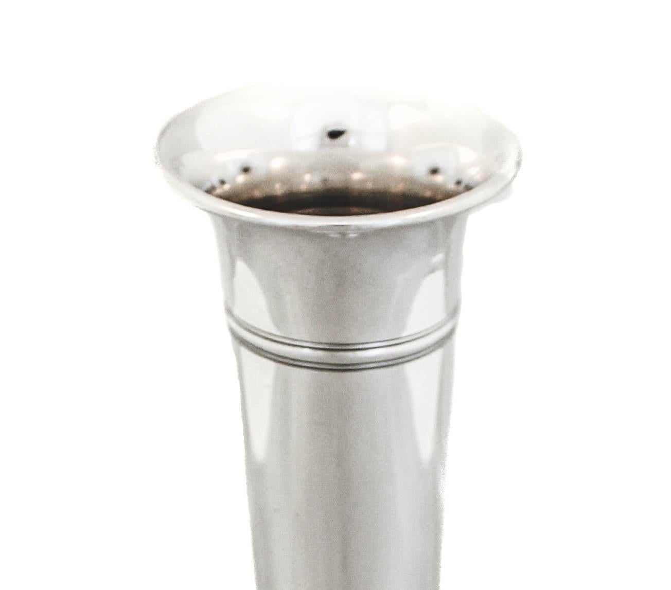 Being offered is a sterling silver vase by the Gorham Silver Company of Providence, Rhode Island. Hallmarked 1914, this piece is sleek and contemporary. A tapered body and a round base. Ideal for a foyer, end table or bedroom. It is not weighted.