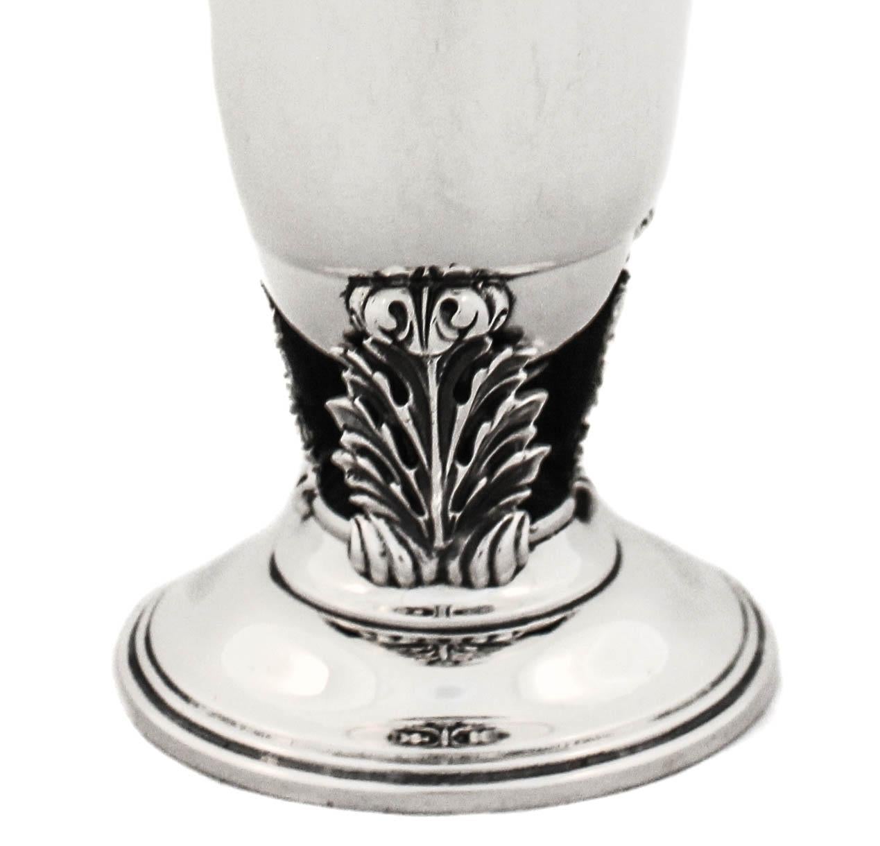 silver footed vase