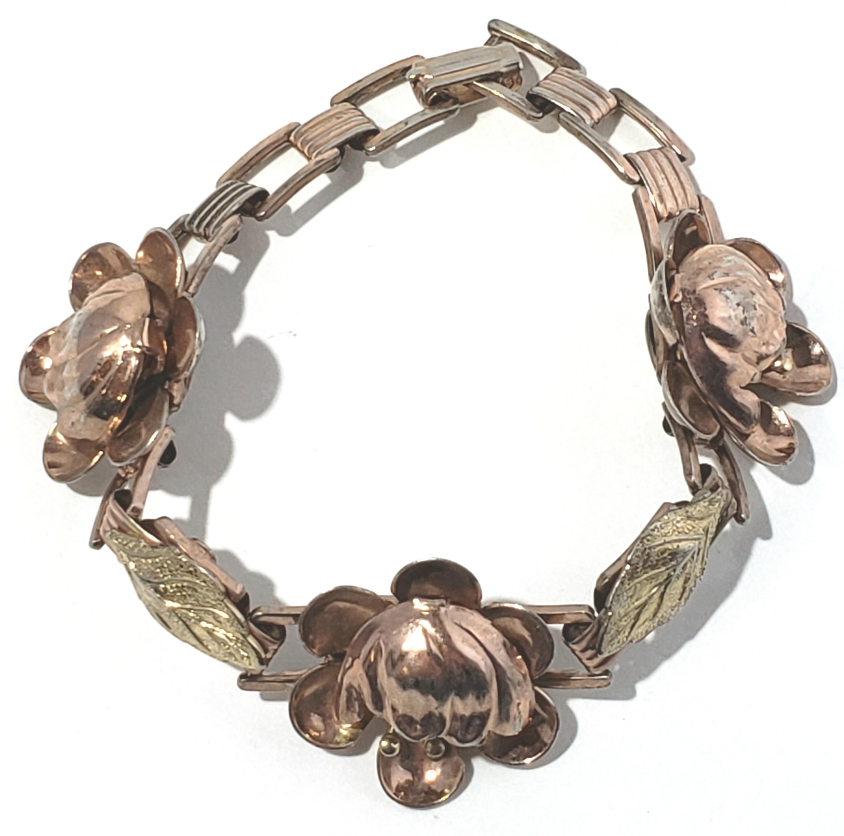 Sterling Silver Vermeil Flower Link Bracelet

This is a lovely Sterling Silver Vermeil Flower Link Bracelet. 

Measurements:  Bracelet measures 7 3/4 inches.  Width is 7/8 inches. 

Weight:  21.0 g / 13.5 dwt  

Condition: In good condition with