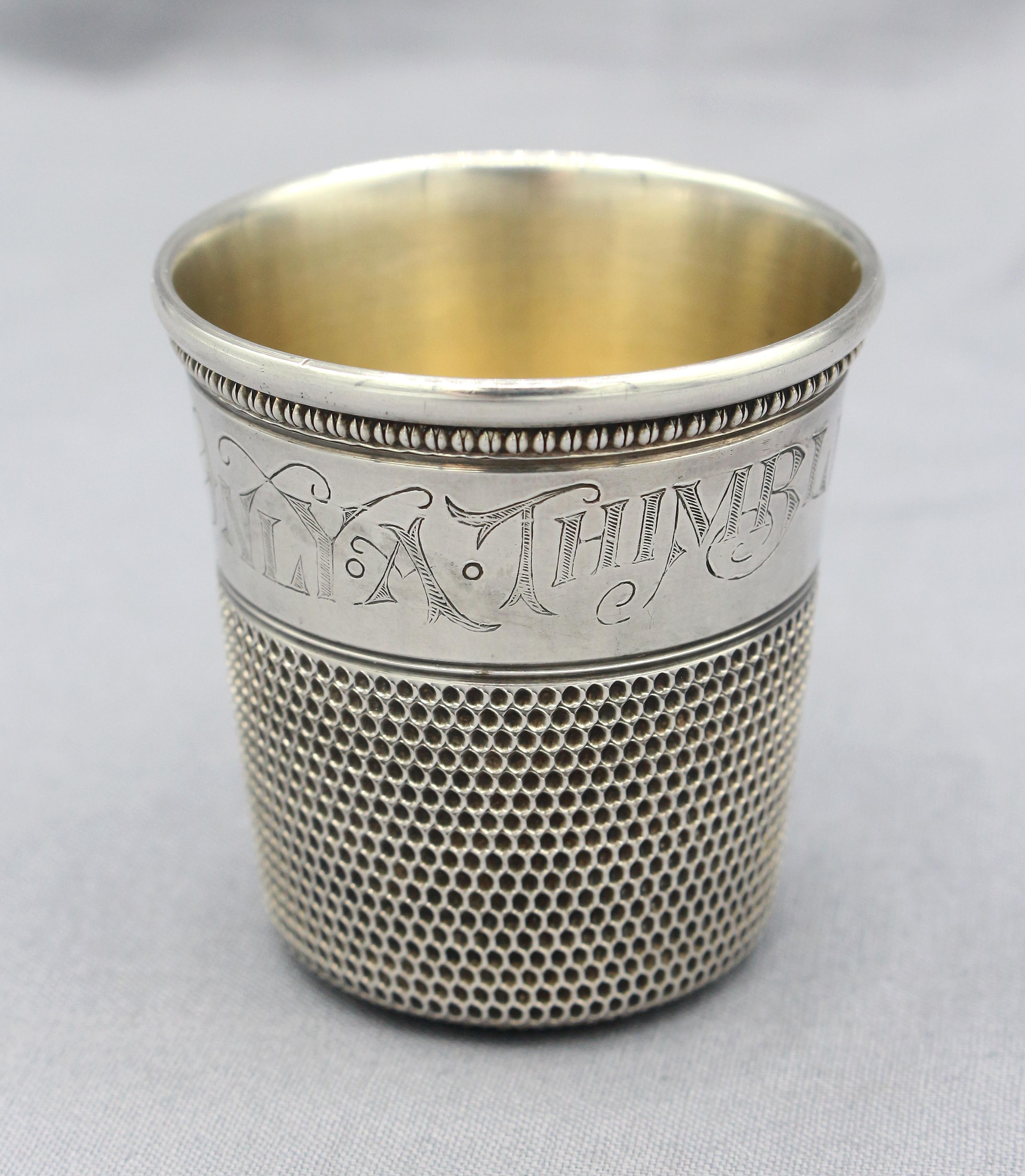Sterling silver & vermeil giant thimble shot glass, late 19th century. Comically engraved 