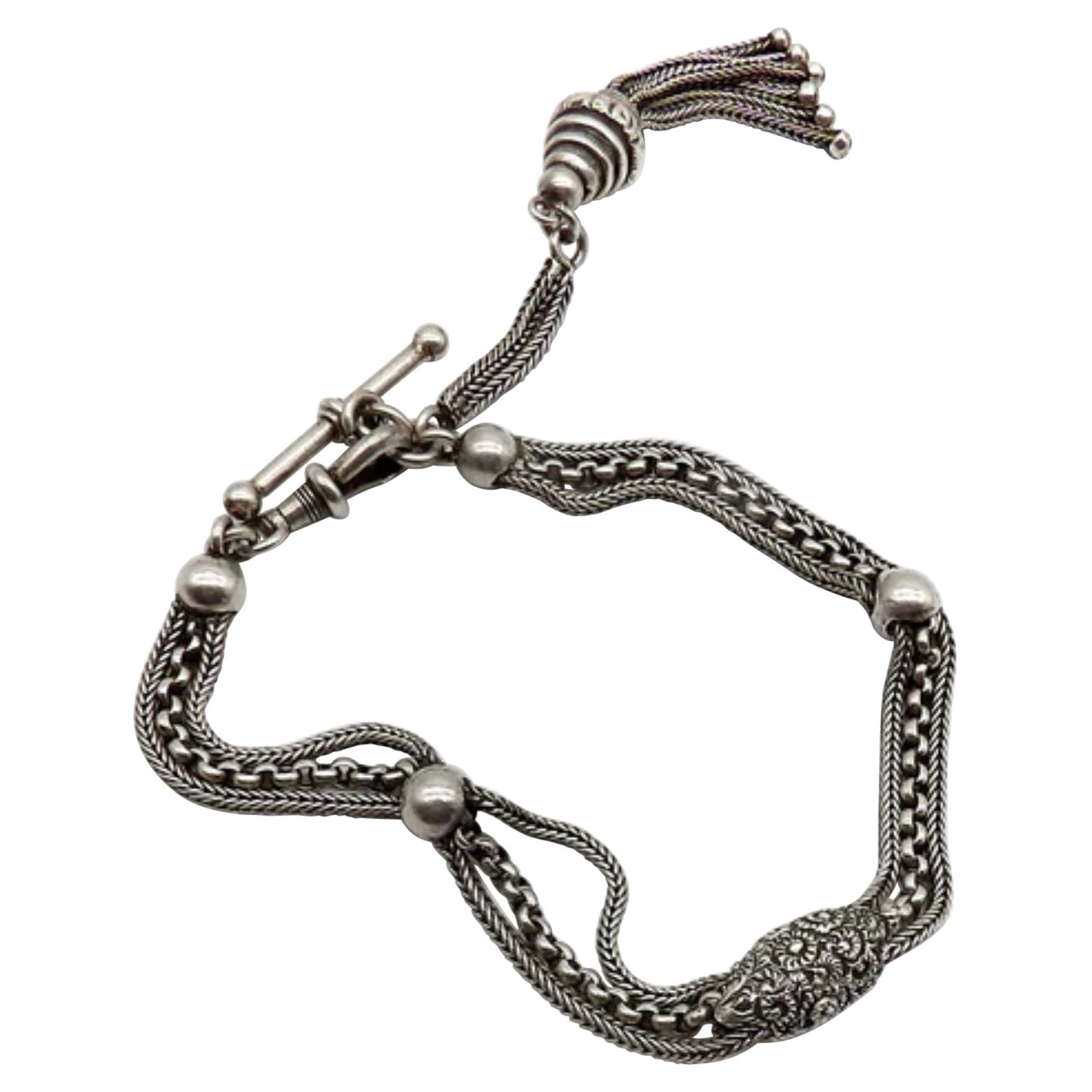 Pulsera y cadena de leontina de reloj victoriano Albertina de plata de ley, circa década de 1890