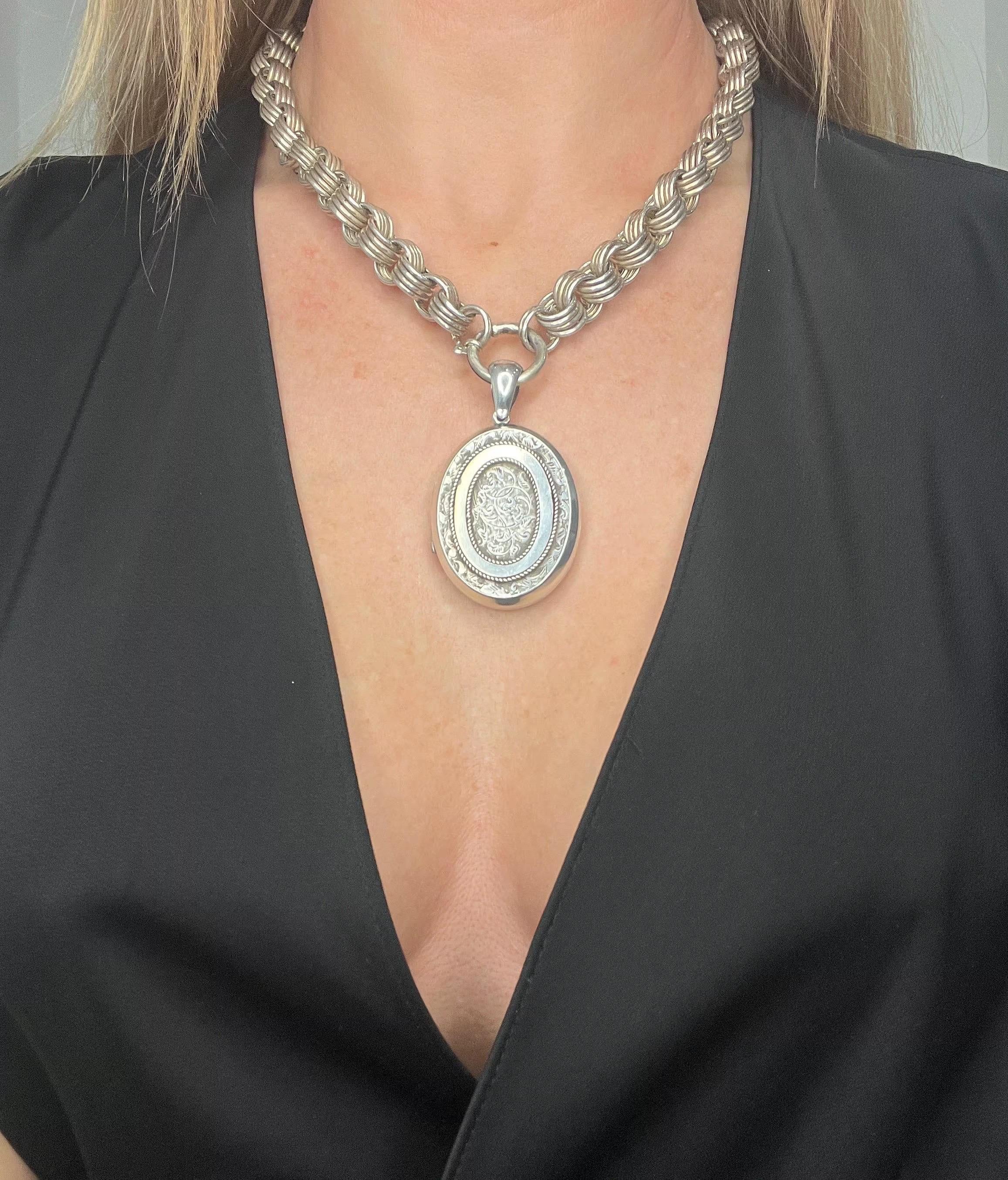 Antique Book Chain Necklace 

Sterling Silver Stamped STG 925

Hallmarked London 1879

Introducing a stunning Victorian-era sterling silver book chain necklace, a true testament to timeless elegance and craftsmanship. This exquisite piece features a