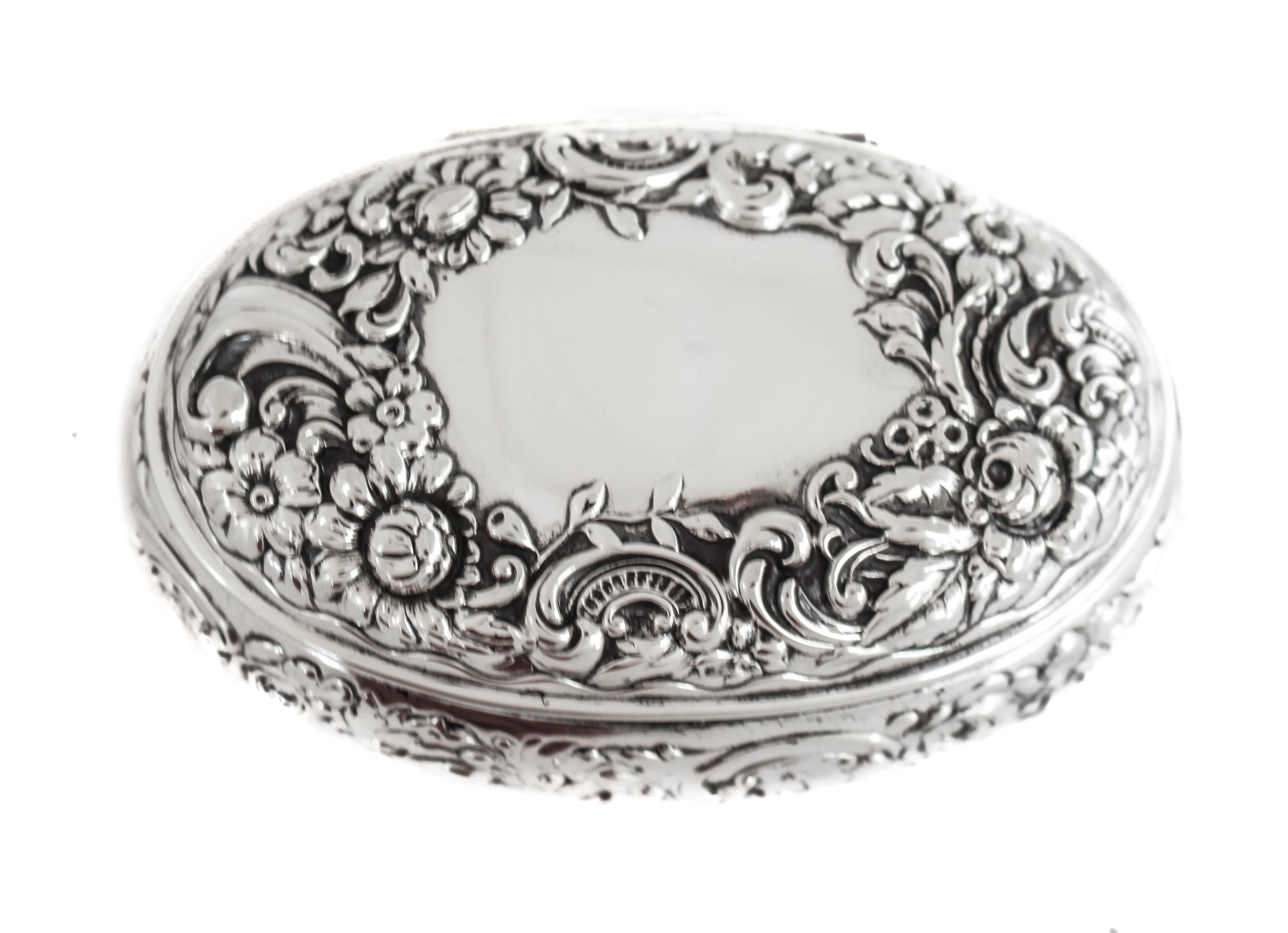 Being offered is a sterling silver (soap) box by Gorham Silversmiths of Providence, Rhode Island.  It can be used for jewelry, pills or as a decorative piece but I think it was meant for soaps.  It has a Repousse motif; flowers, leaves and swirls