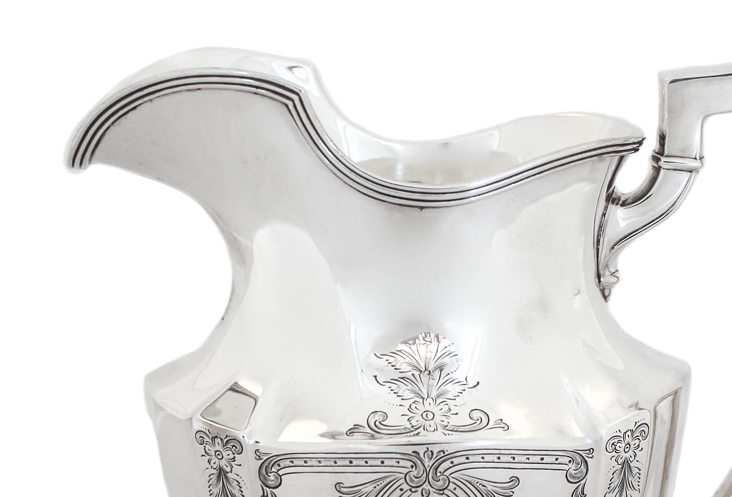 We are delighted to offer you this sterling silver water pitcher by Gorham Silversmiths, hallmarked 1928. The pattern is the iconic “Plymouth” only this one is engraved (Plymouth, engraved). It has that distinctive shape that’s synonymous with