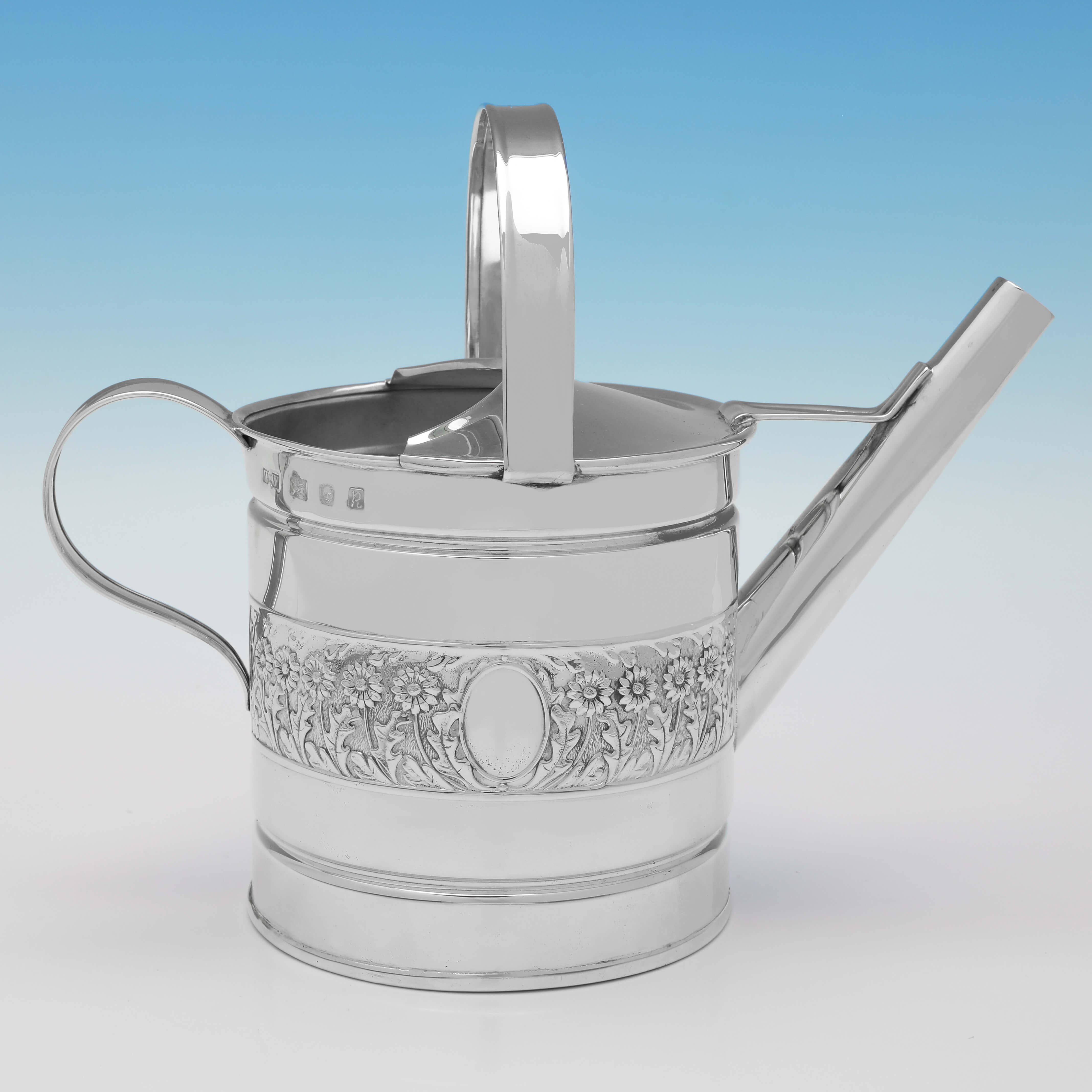 Hallmarked in London in 1991 by Whitehill Silver & Plate Company, this attractive, Sterling Silver Watering Can, would make an ideal piece for any gardening enthusiast. The watering can measures 7.25