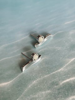 Sterling Silver Wave Earrings with White Baltic Amber