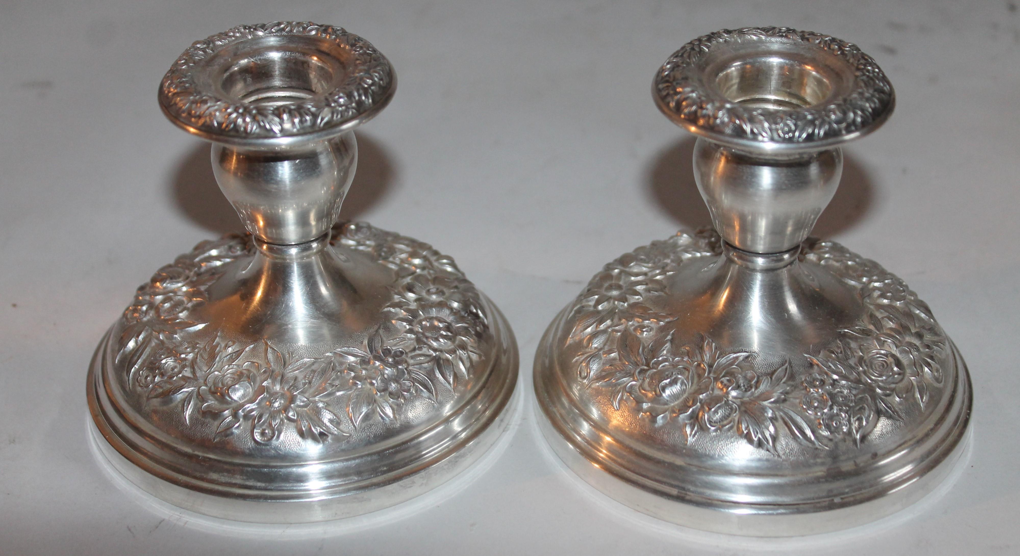 4.75 x 3.75 candle sticks/ These heavy sterling silver S.Kirk & Sons weighted candle holders are in pristine condition.
