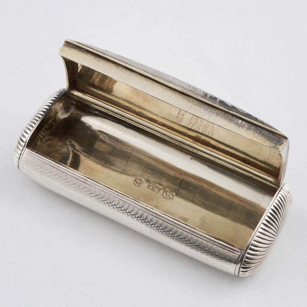 Heading: sterling silver snuff box
Date: Hallmarked in Birmingham 1830 For Thomas Shaw
Period: William IV
Origin: Birmingham, England
Decoration: Rectangular shape, curved and finely engine turned on all sides .Flat 'invisible' hinge. Parcel