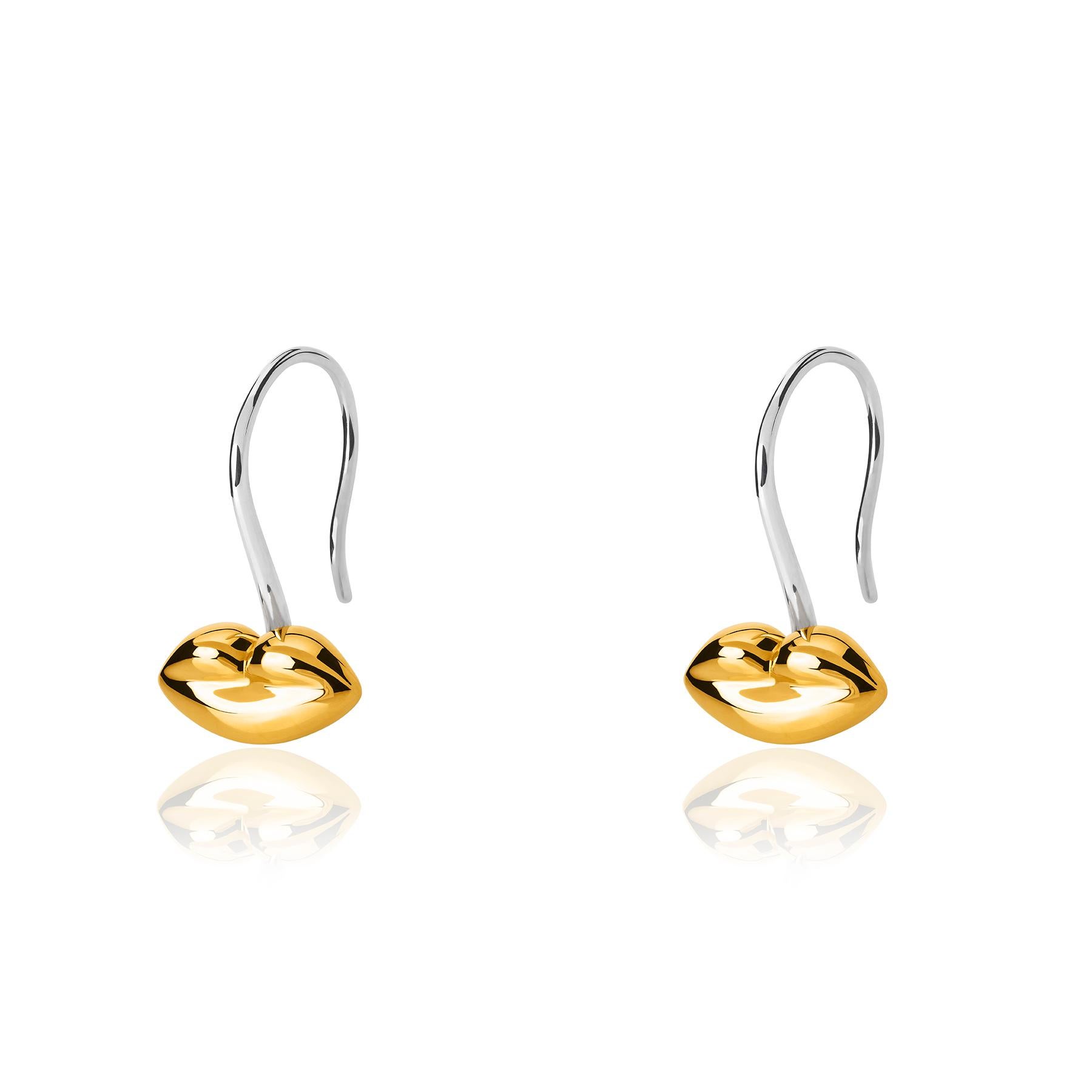 The Bésame Solitaire Vermeil Earrings from the Bésame collection by TANE are made in sterling silver. In each piece, a kiss gently sculpted in TANE's vision hangs from a drop-shaped hook, the best way to give a kiss that lasts forever. Handmade in