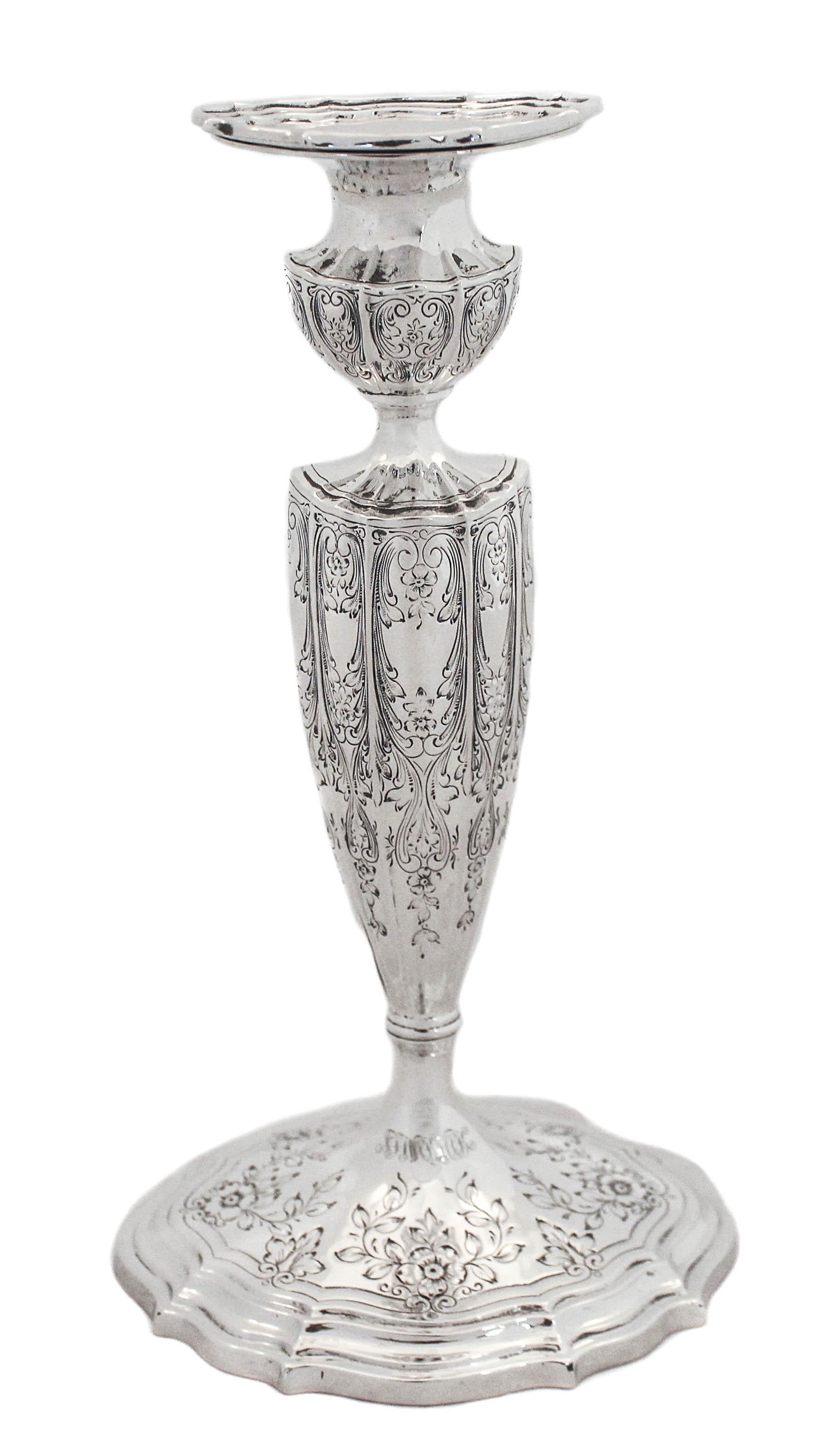We are delighted to offer you this pair of sterling silver candlesticks by William Durgin Silver. If you appreciate delicate old-world work, these candlesticks are for you!! Beautifully crafted and etched with flowers, leaves and garlands around the