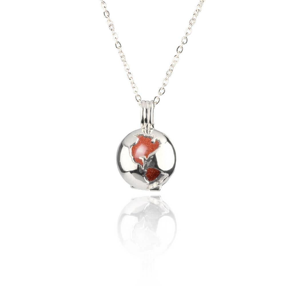 This beautiful and unique Globe Locket with an intricate design that illustrates all the countries of the world encapsulates the essence of all the precious gifts the Earth has for us. Its delicate design lets you place inside a Golden Sand Stone,