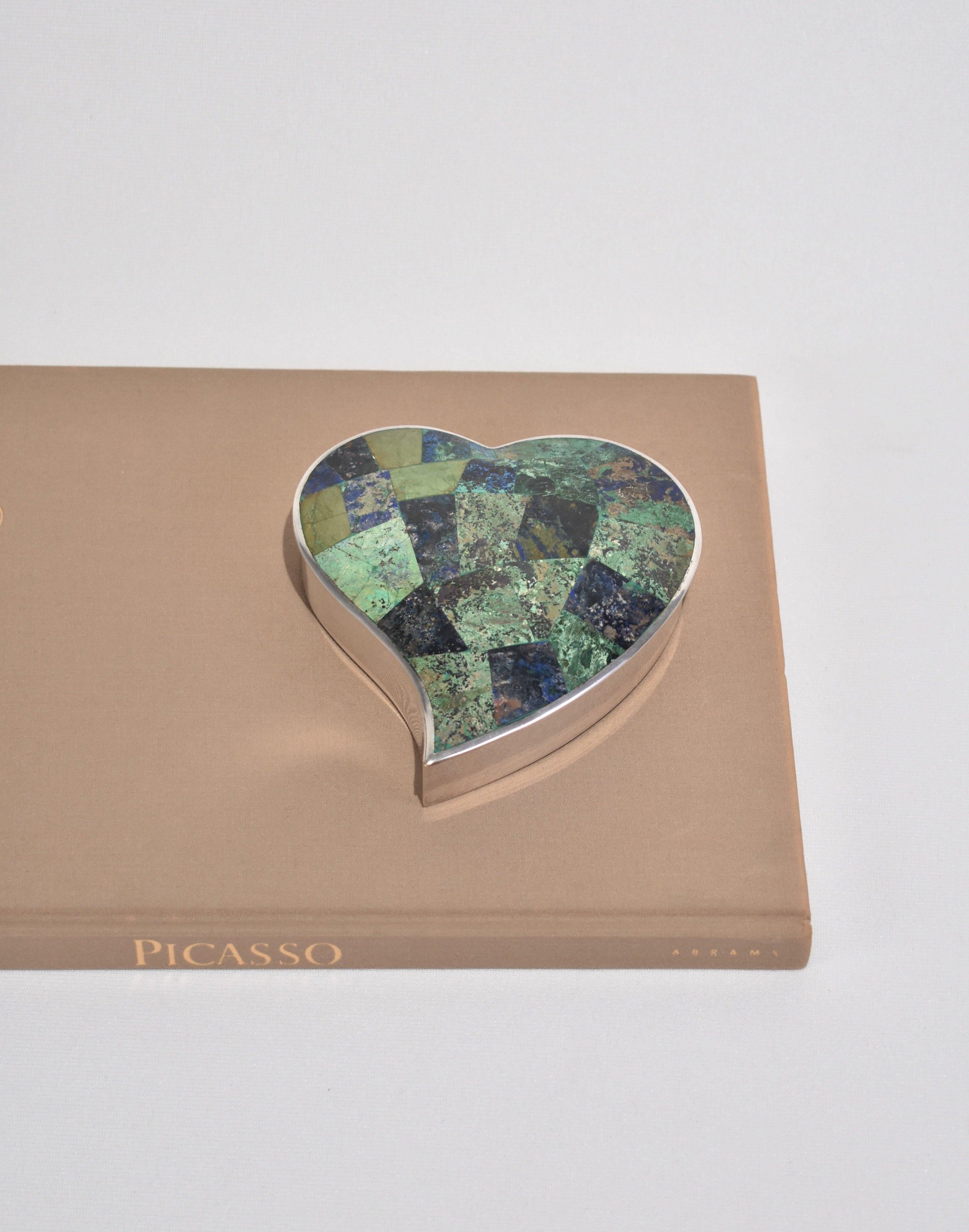Rare, heart shaped box in Mexican silver with malachite and lapis stone lid. Stamped on base, Los Castillo Taxco. Ca 1960s.