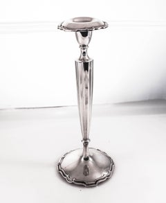 Candelieri alti in argento