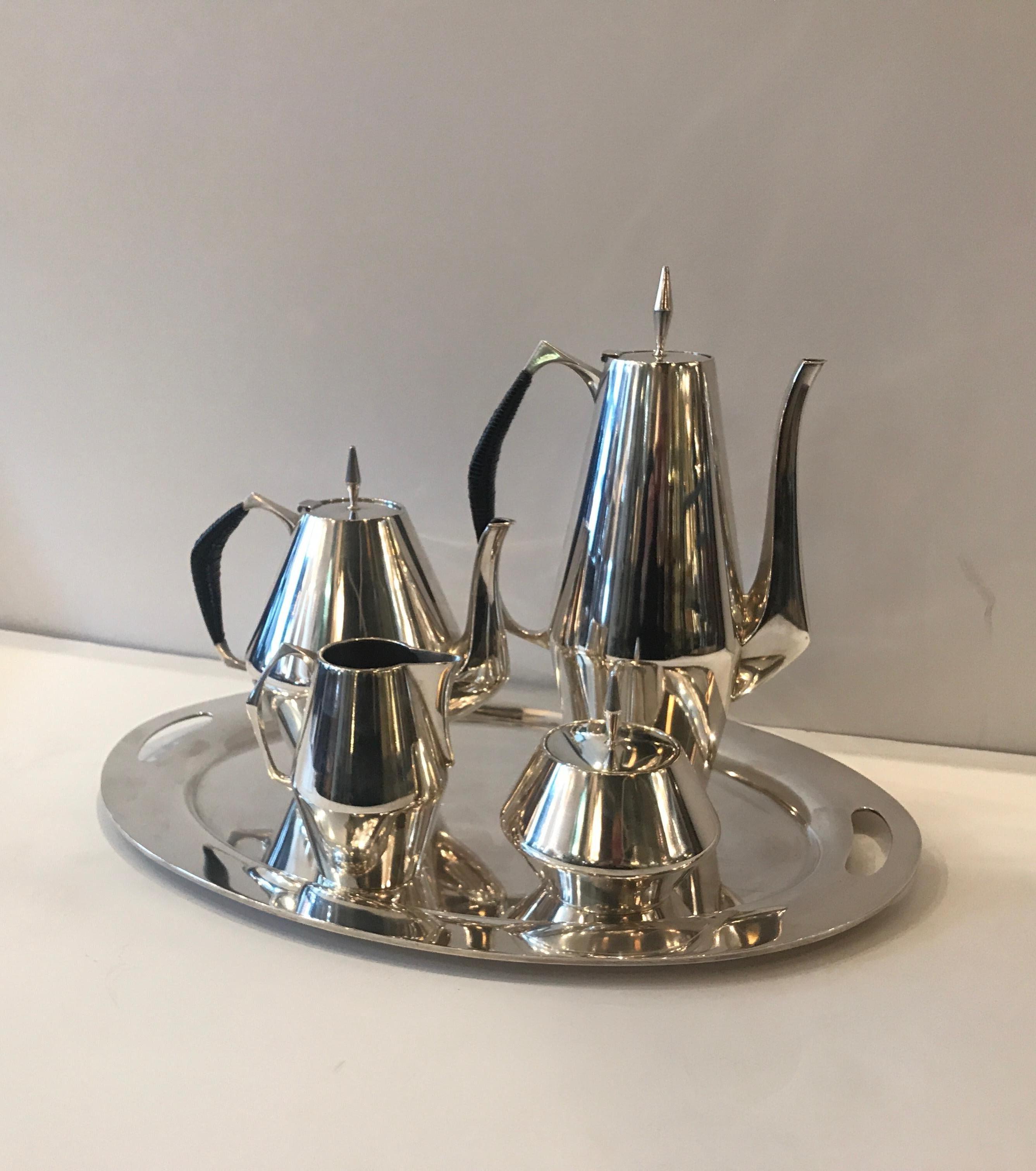 A sterling tea service with sterling tray designed by Gio Ponti for Reed and Barton, pattern 440 