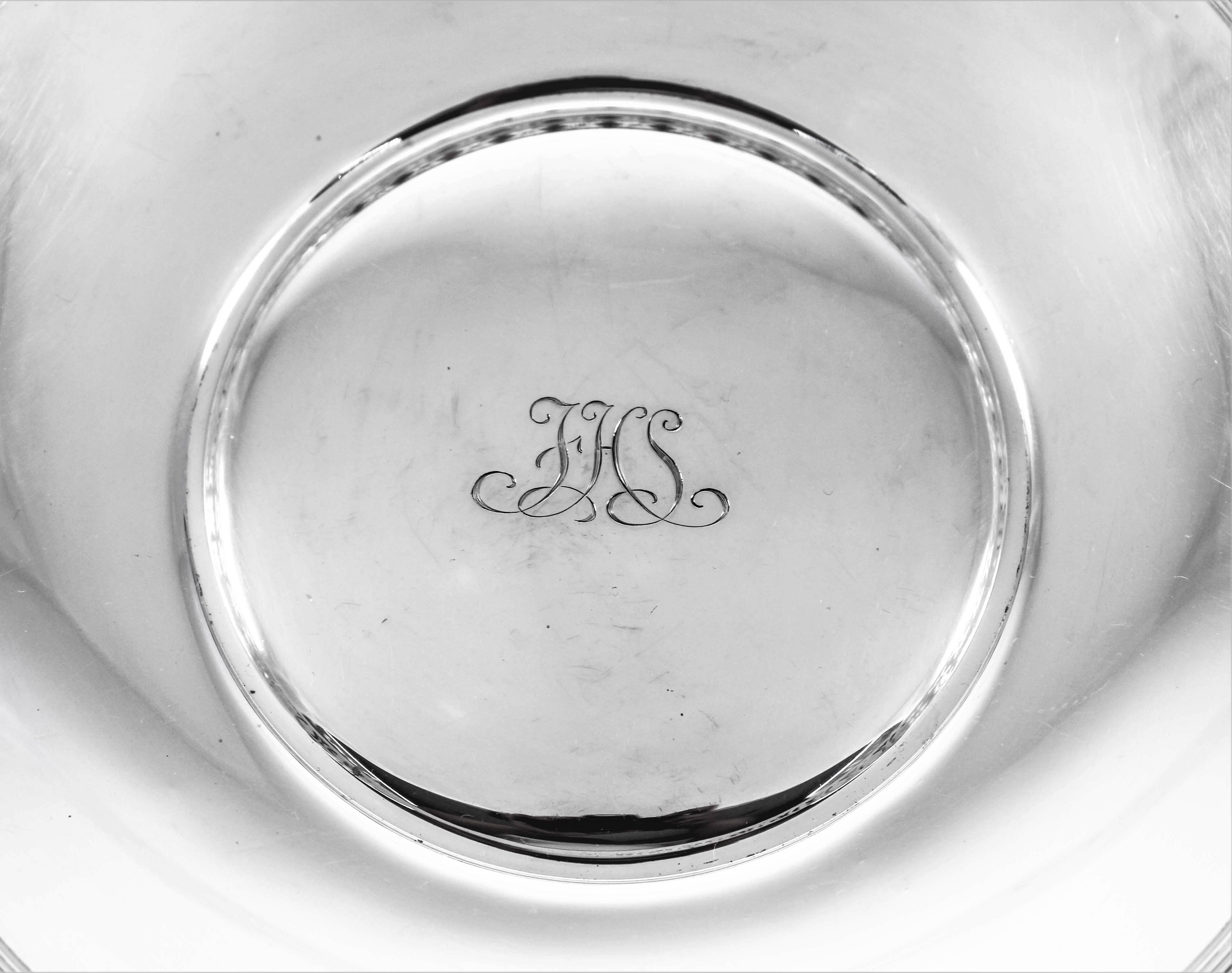 A reticulated border encloses this Tiffany & Company bowl. In the center there is a hand engraved monogram. A nice practical size for intimate parties.
 