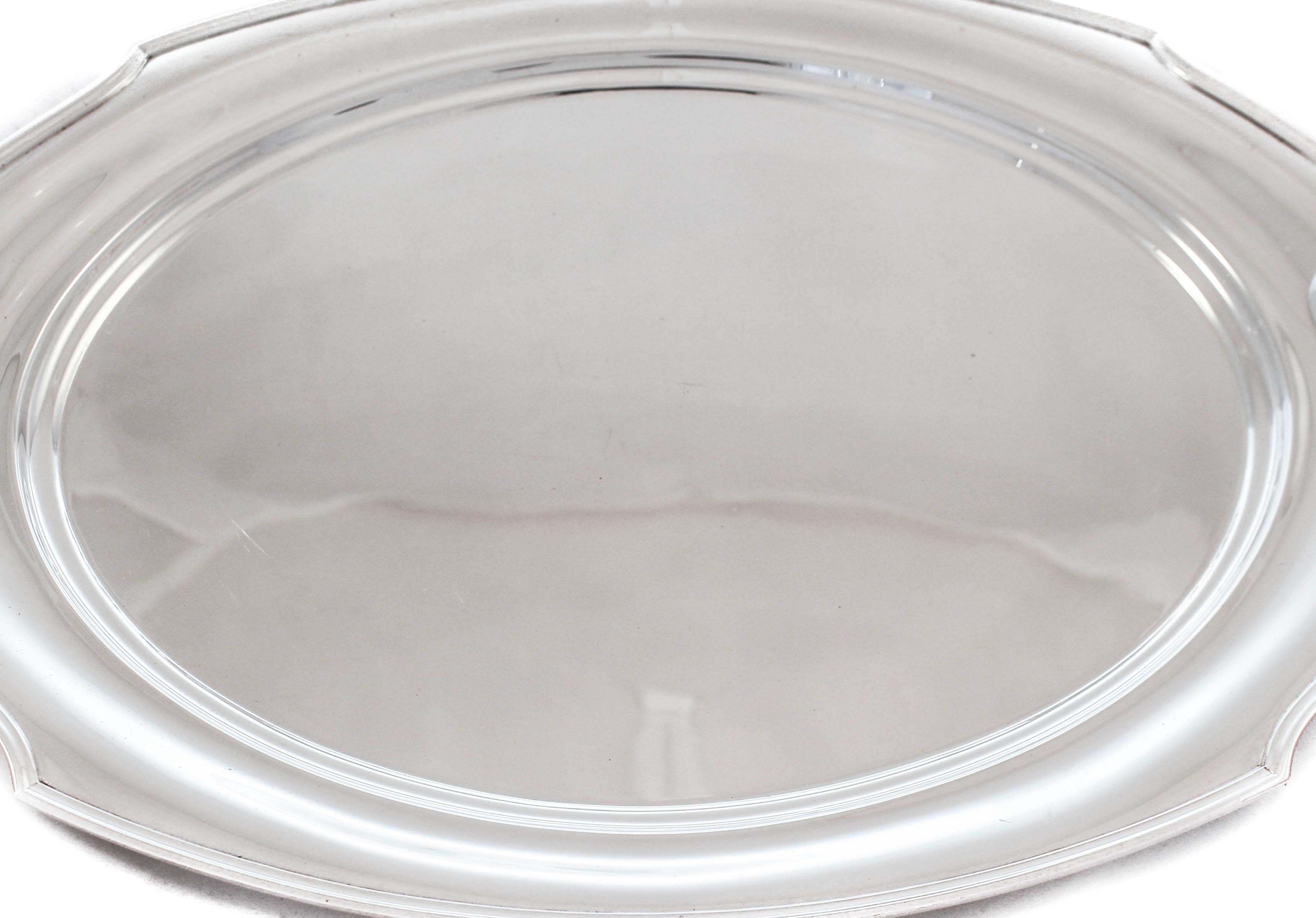 We are happy to offer this sterling silver tray made by International Silver of Meriden, Connecticut.
Manufactured during WWII, it reflects the austerity of the time. No fancy designs or etchings, just an understated and unadorned look. It has a