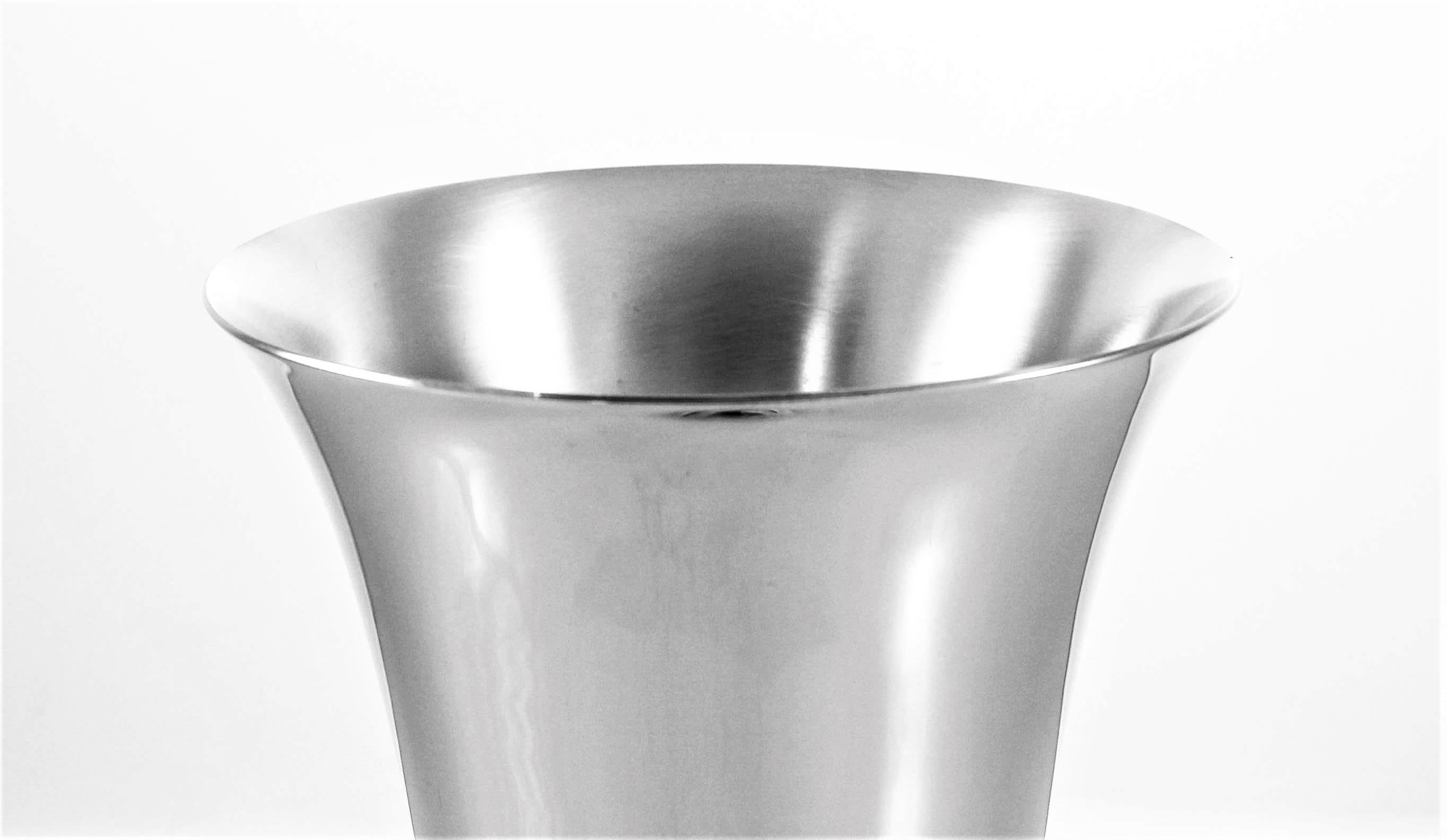 We are proud to offer this Art Deco sterling silver vase. Art Deco combined modernist styles with fine craftsmanship and rich materials. During its heyday, Art Deco represented luxury, glamour, exuberance, and faith in social and technological