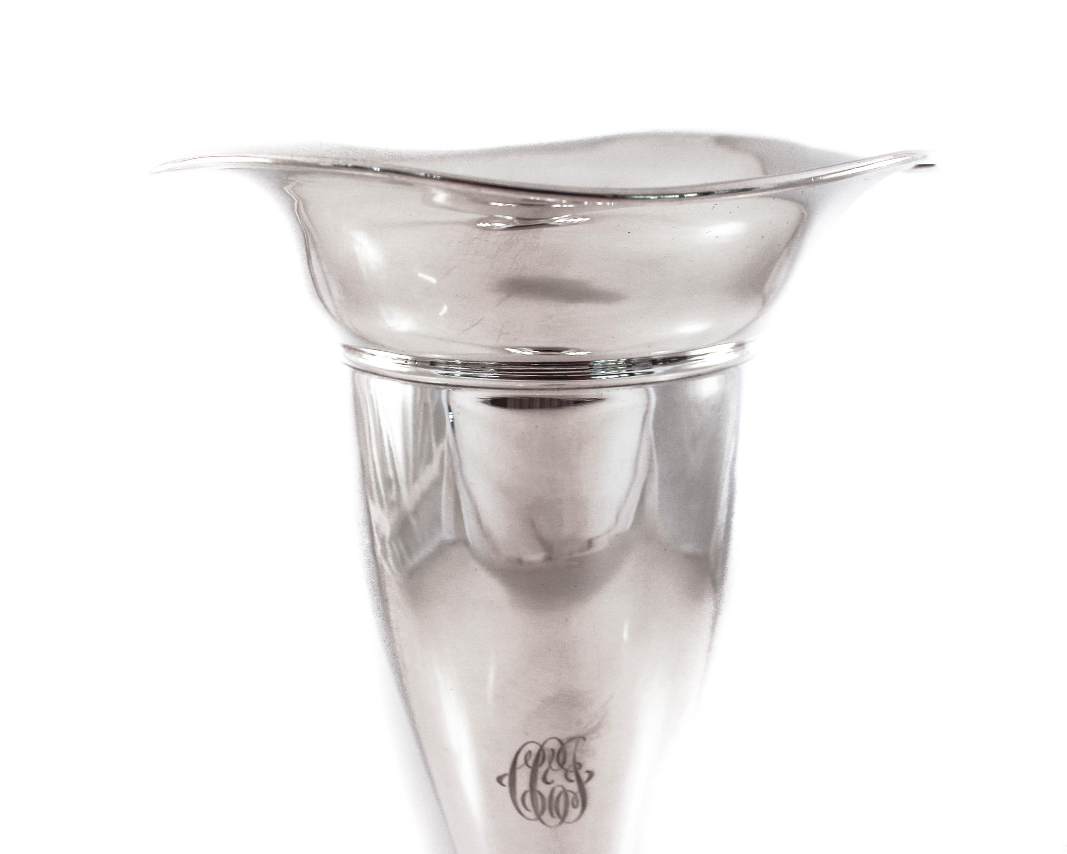 We are delighted to offer this sterling silver vase by J.F. Fradley & Company of New York. Manufactured in the early part of the 20th century, it was ahead of its time in that it was not heavily decorated. It has a very simple yet elegant shape; it