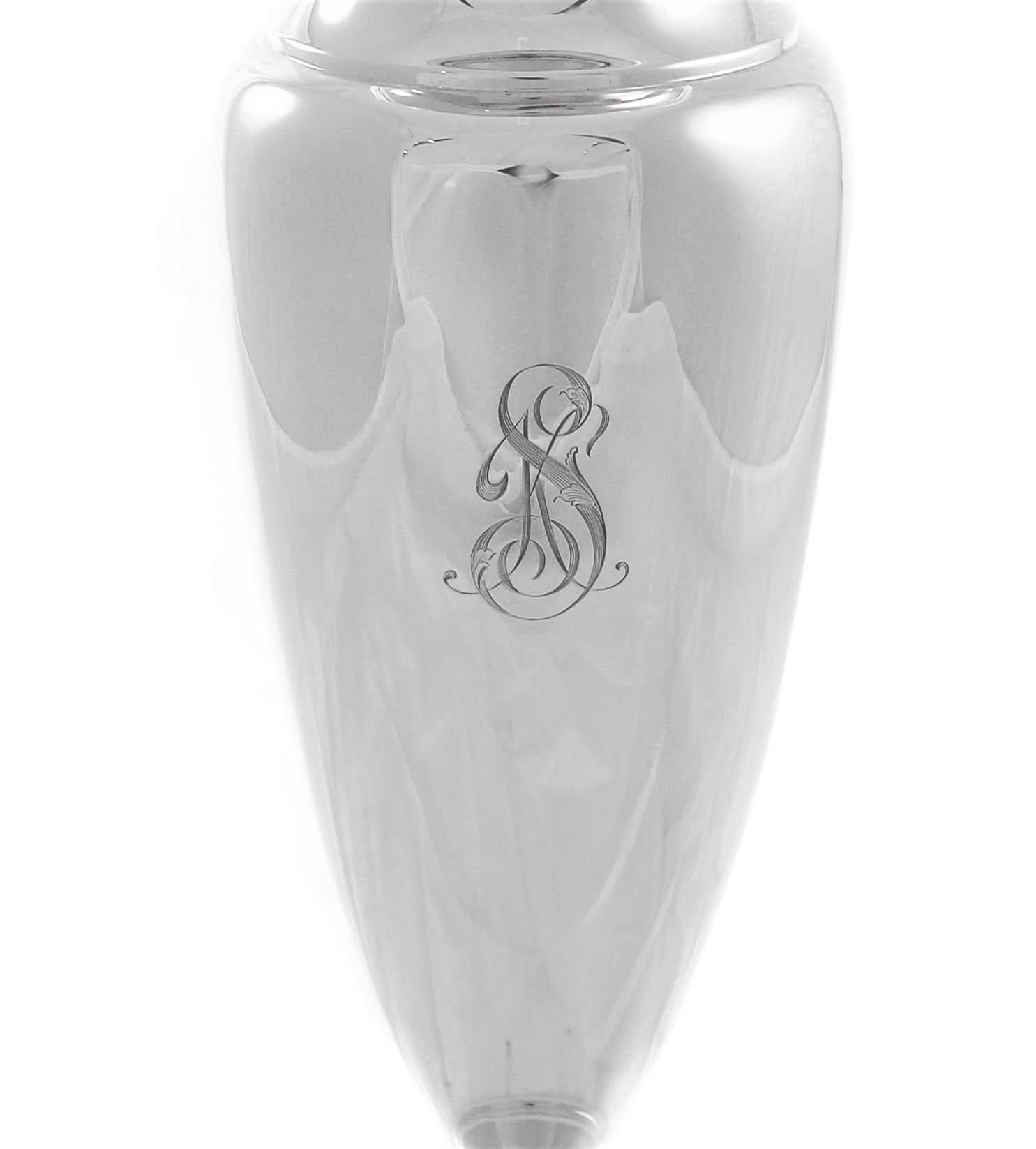 We are delighted to offer this sterling silver vase by Frank W. Smith Silver Company of Massachusetts. It is an elegant and understated piece and rather unusual in that it was unadorned which was uncommon for the time. Notice the simple shape and