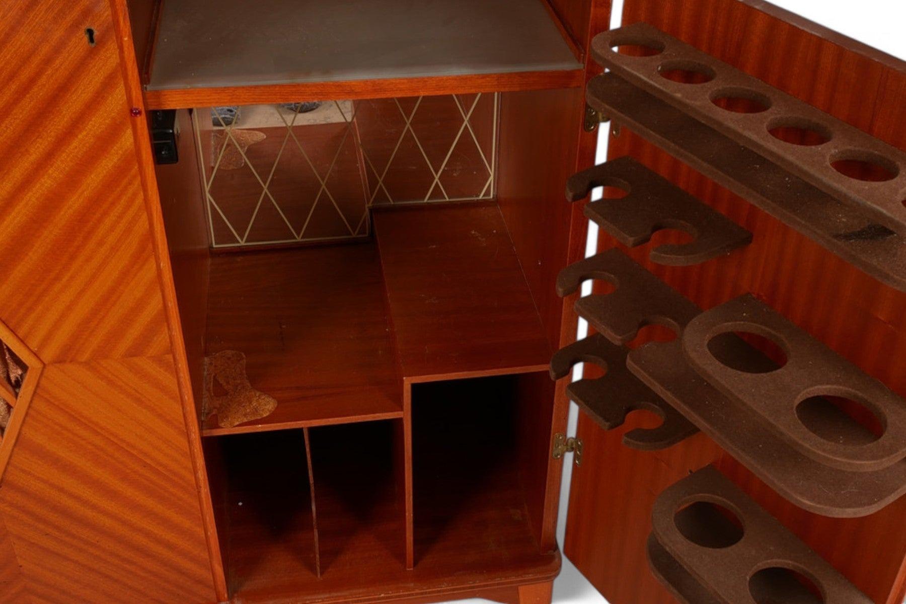 Origin: Sweden
Designer: Unknown
Manufacturer: Stern + Stern
Era: 1960s
Materials: Mahogany
Measurements: 35.5″ wide x 16.5″ deep x 45.5″ tall