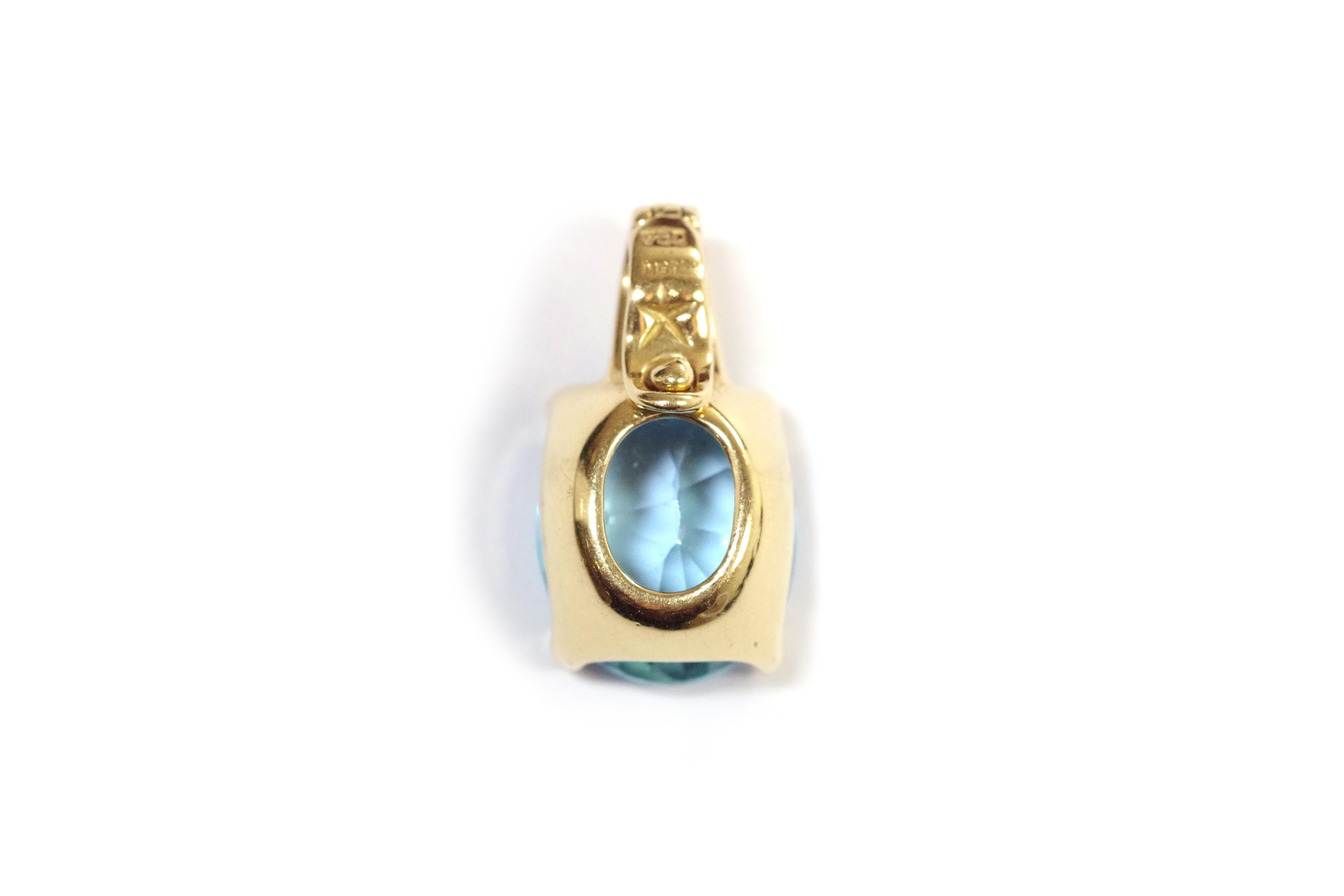 Contemporary Stern topaz pendant in 18 karat yellow gold For Sale