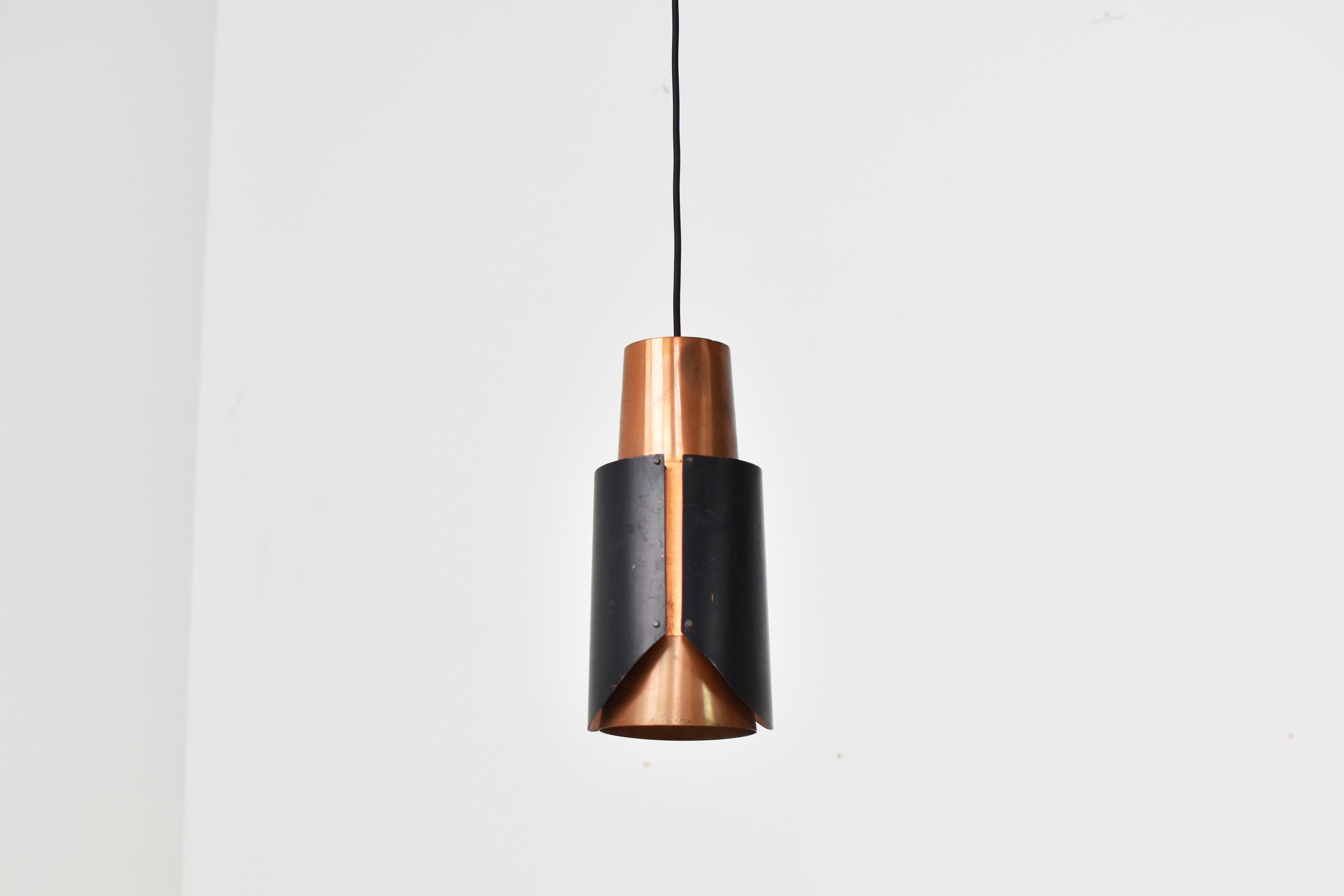 ‘Østerport’ pendant by Bent Karlby for Lyfa, Denmark 1960’s. This lamp is made out of thin copper and black lacquered metal. Good original condition with some visible wear from age and use. Newly rewired.