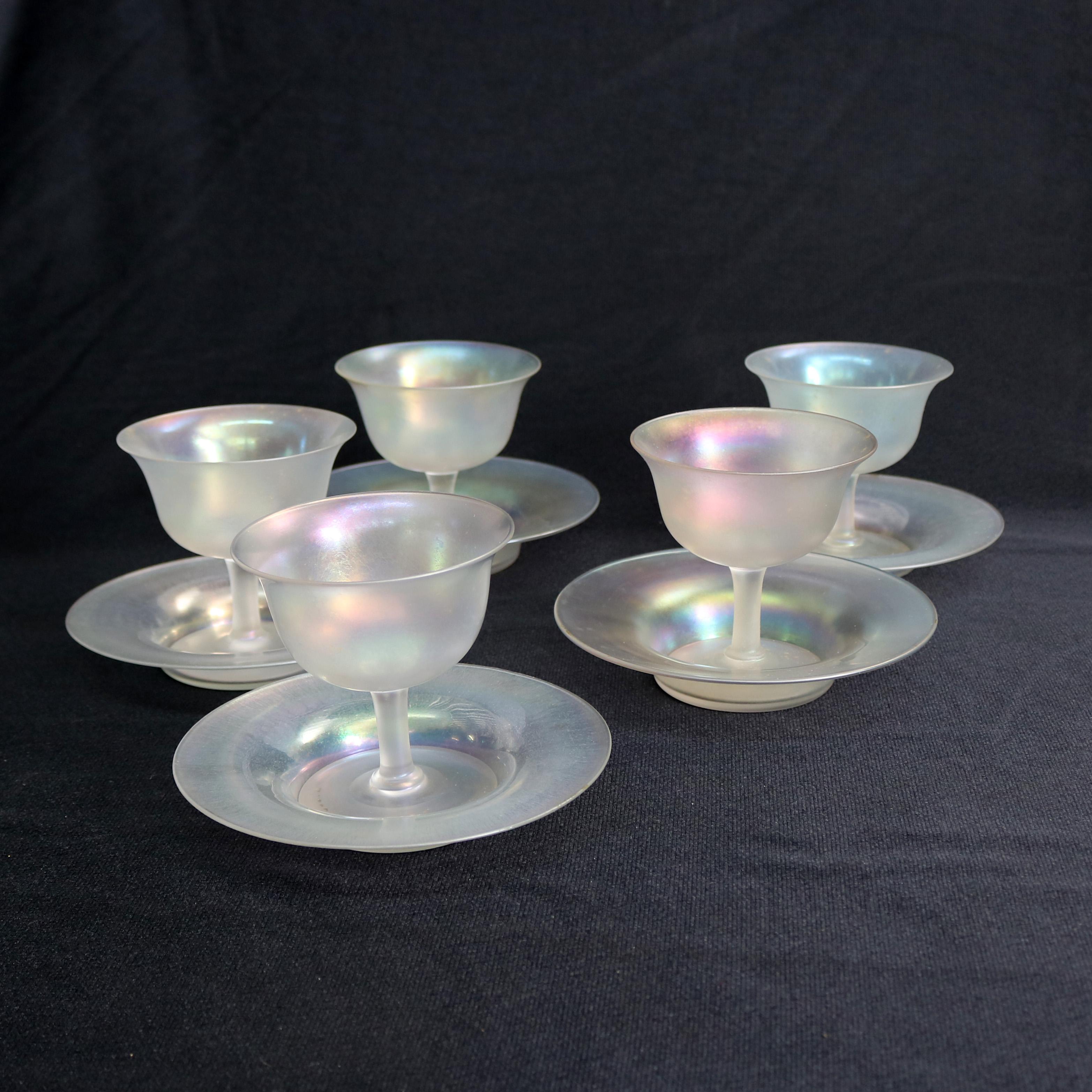 Five sets of sherbet stemmed goblets with saucers by Steuben offers iridized art glass construction, includes one extra saucer, circa 1930

Measures: 3.75