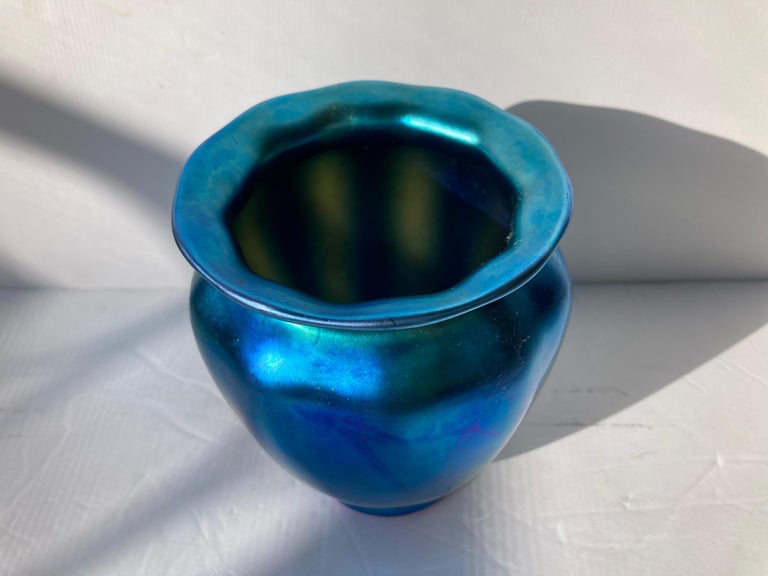 Beautiful Steuben blue Aurene vase with ribbed rim open top.