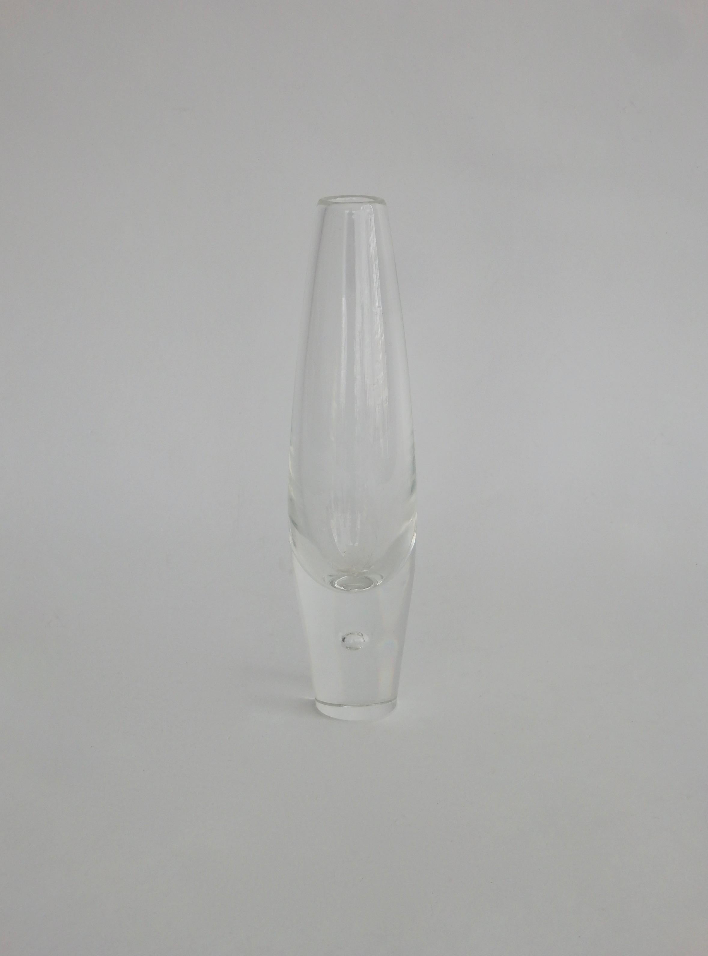 Oval form vase with heavy controlled bubble base. Marked Steuben.