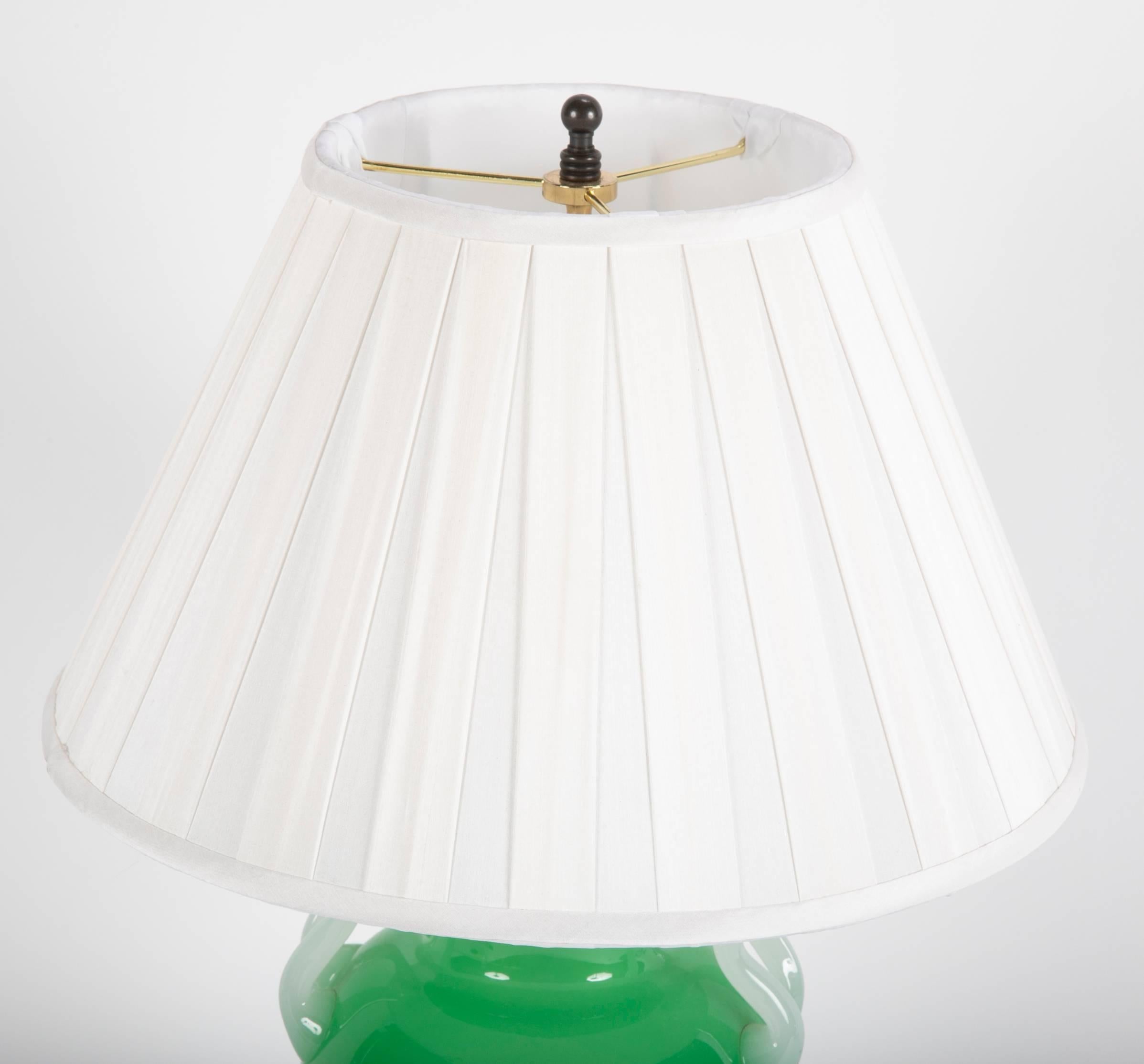 A jade green Steuben glass vase now electrified and mounted as a table lamp. Unsigned.