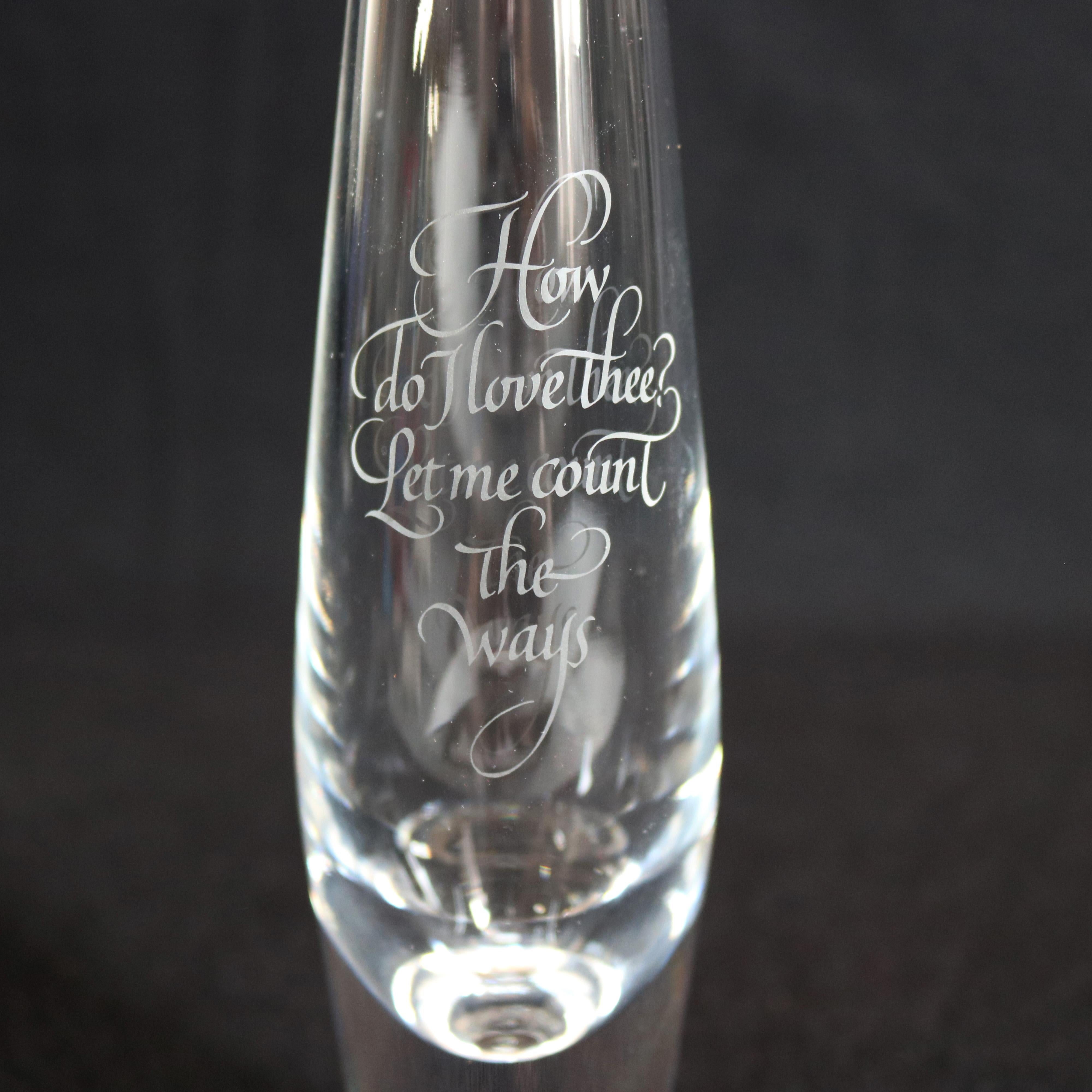 Mid-Century Modernist Steuben mouth blown Teardrop Bud vase features colorless art glass with single suspended air bubble in base designed by David Hills 1949 for Corning Museum of Glass with engraved 