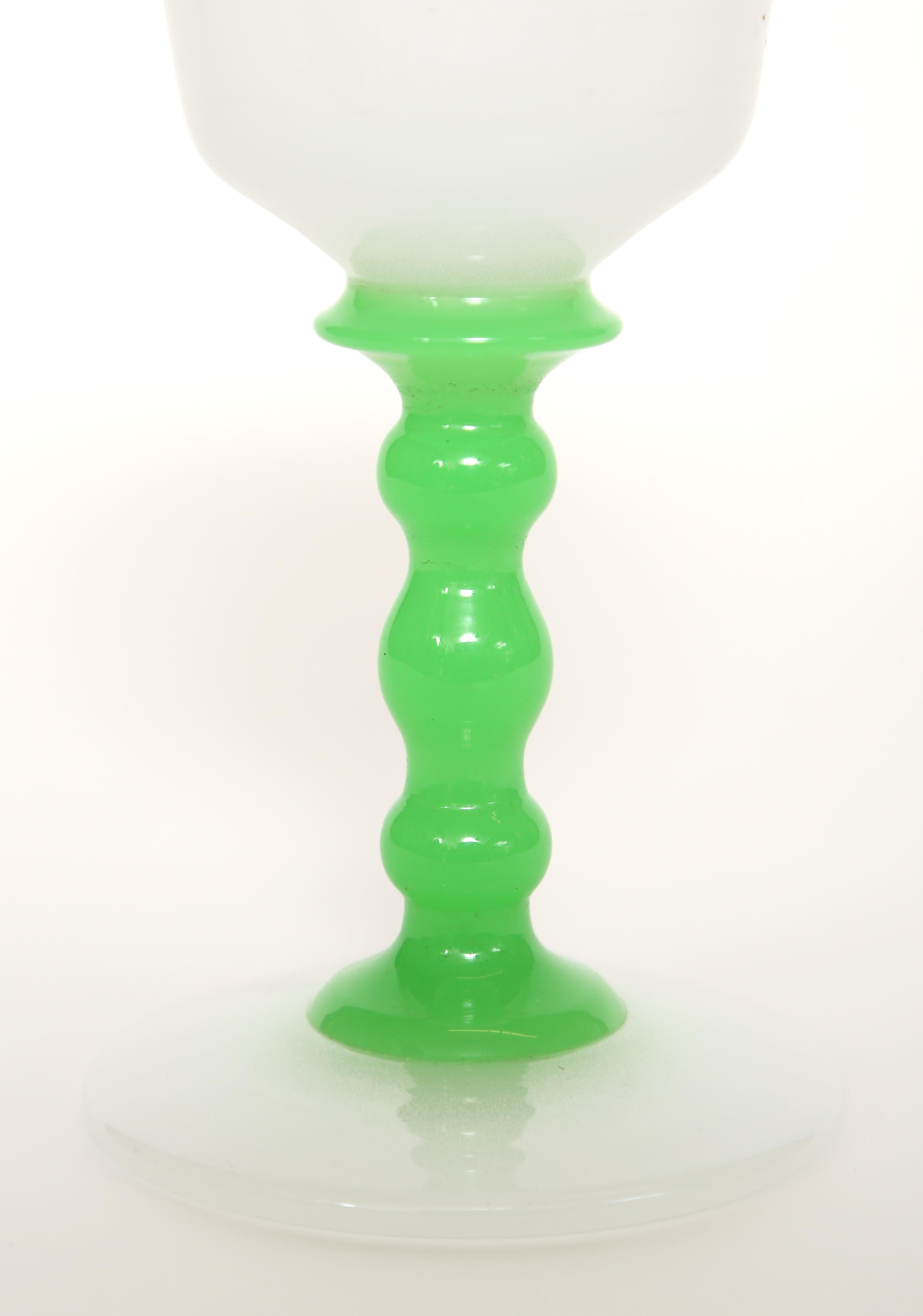 Steuben or Stevens & Williams opaline alabaster colored glass goblet with a jade green stem. The jade green color is luminous. This goblet or wine glass is hand blown with a polished pontil on the base. Frederick Carder produced many pieces of glass