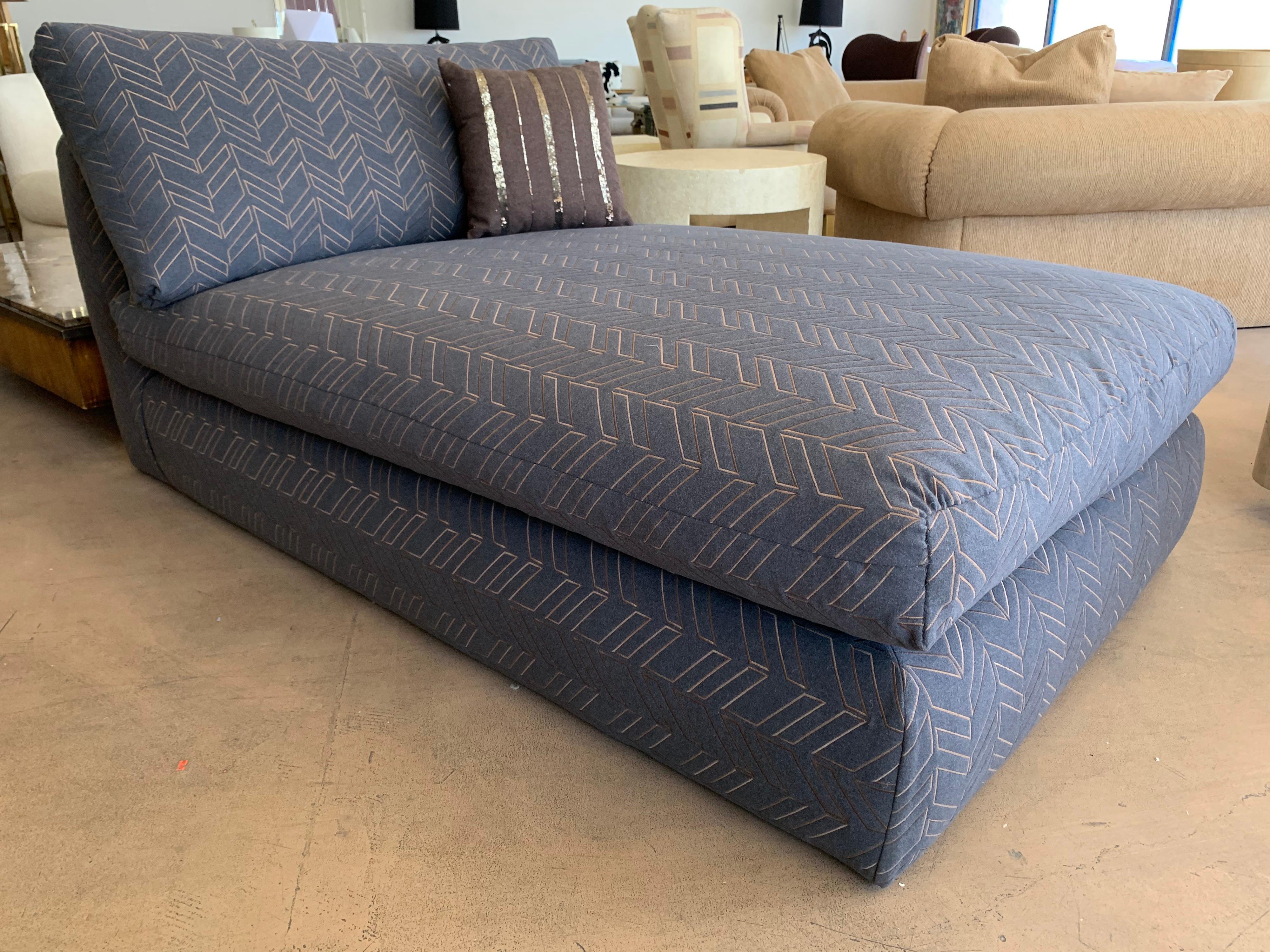 This amazing chaise lounge came from the multimillion dollar Ray Kroc estate that was entirely designed by legendary Steve Chase. We have redone it in a very high-end gray flannel fabric with bronze colored modernist Chevron embroidery. The chaise