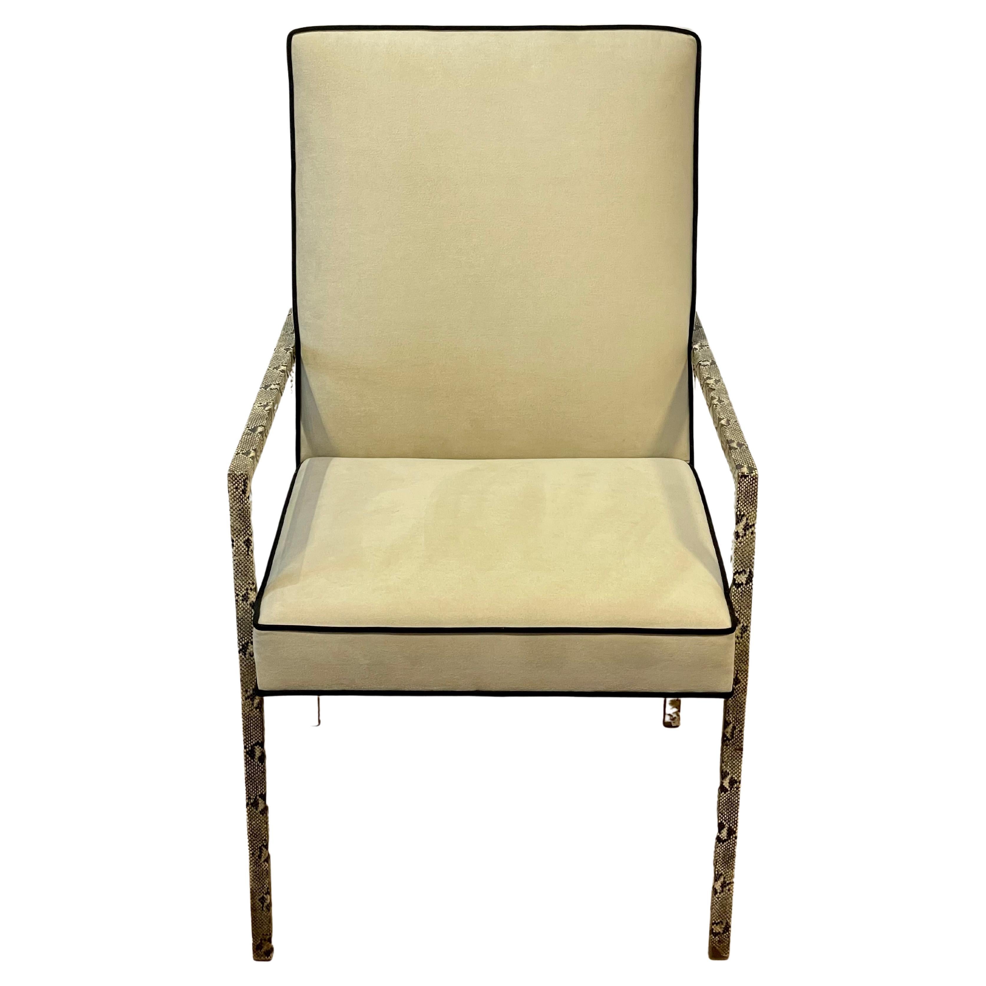 Steve Chase designed set of dining chairs with steel legs, wrapped in original faux python unbiased leather. Newly upholstered seats in beige Ultrasuede with chocolate Ultrasuede piping. Can be sold in 2 sets of 6.