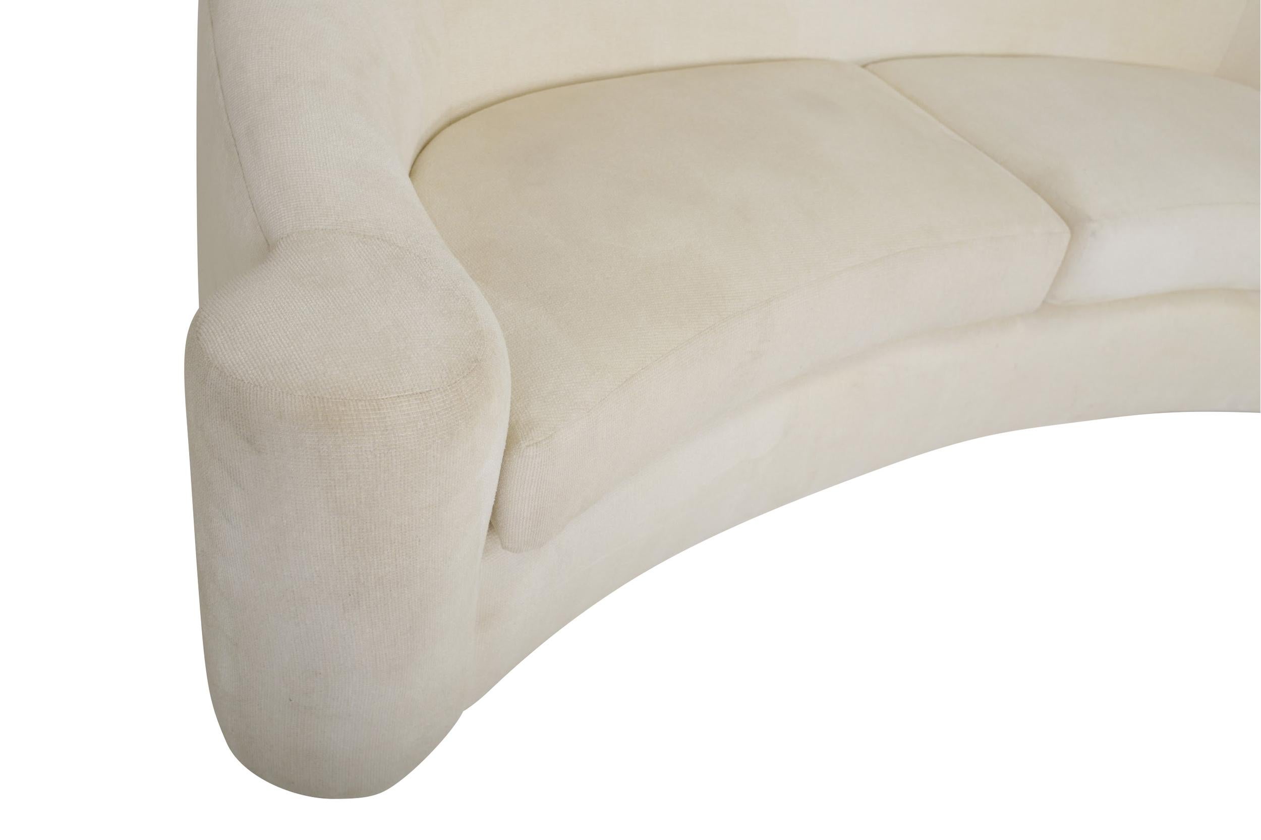 Wide arm sofa designed by Steve Chase for Martin Brattrud in 1994. Original white chenille upholstery shows signs of use.
  