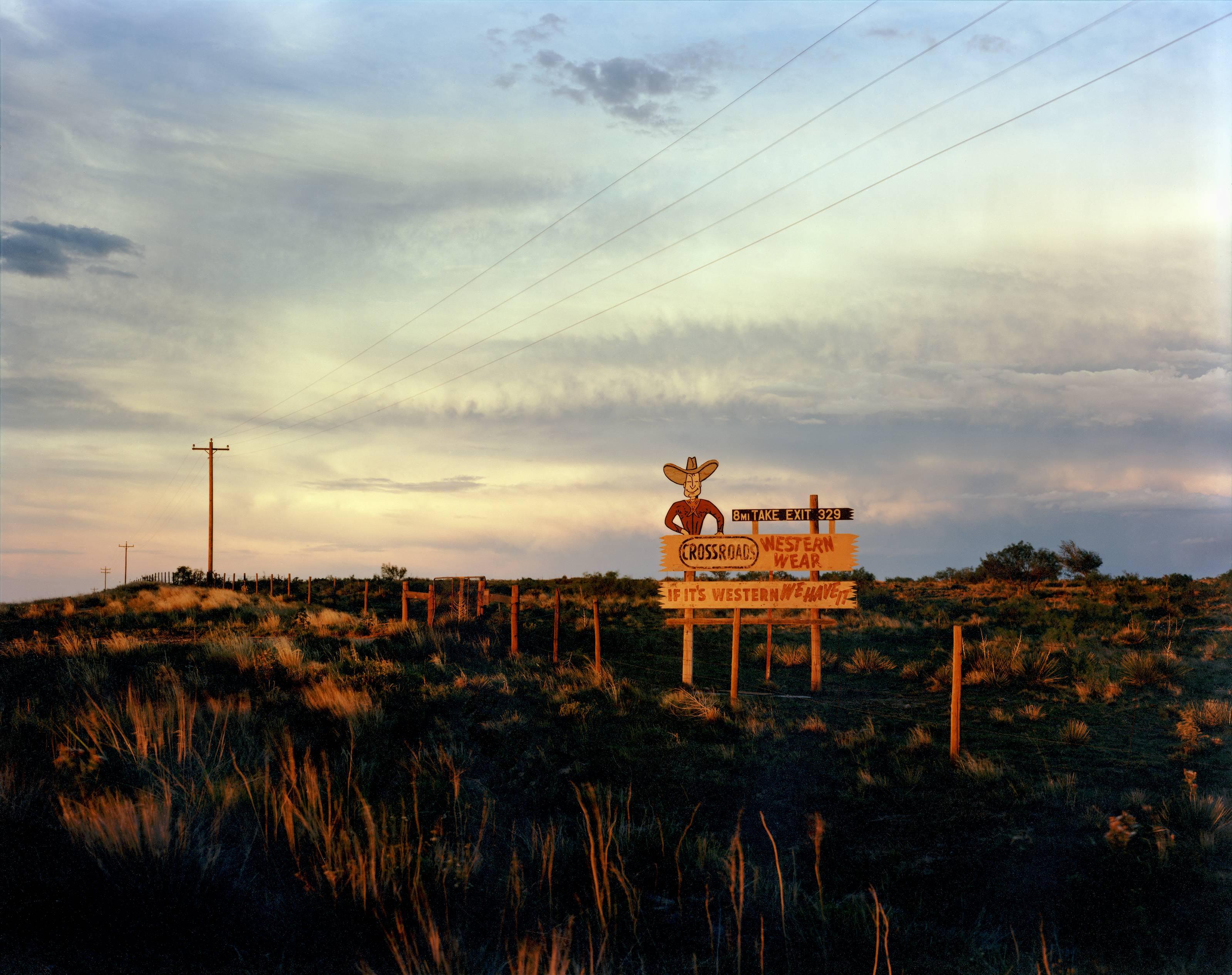 Steve Fitch Landscape Photograph - Sign on I-40 West of Tucumcari, New Mexico, July, 1990