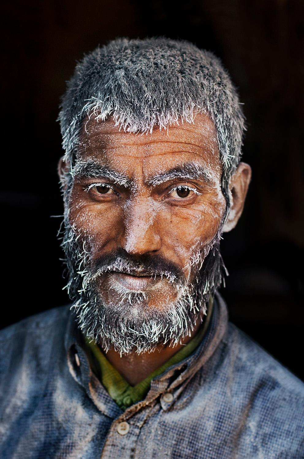 Steve McCurry Color Photograph - Candy Factory Worker