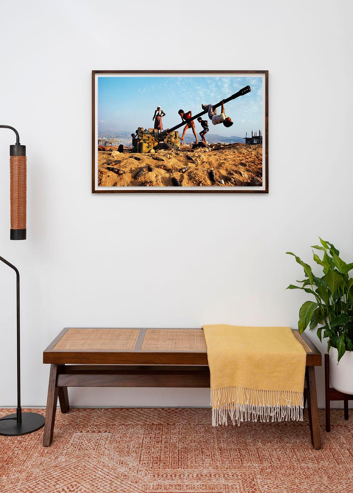 Children Play on Tank, Lebanon, 1982 - Steve McCurry (Colour Photography)
Signed and numbered on photographer's edition label on reverse 
Digital c-type print
20 x 24 inches 
From an edition of 30  

Also available in two larger sizes, please