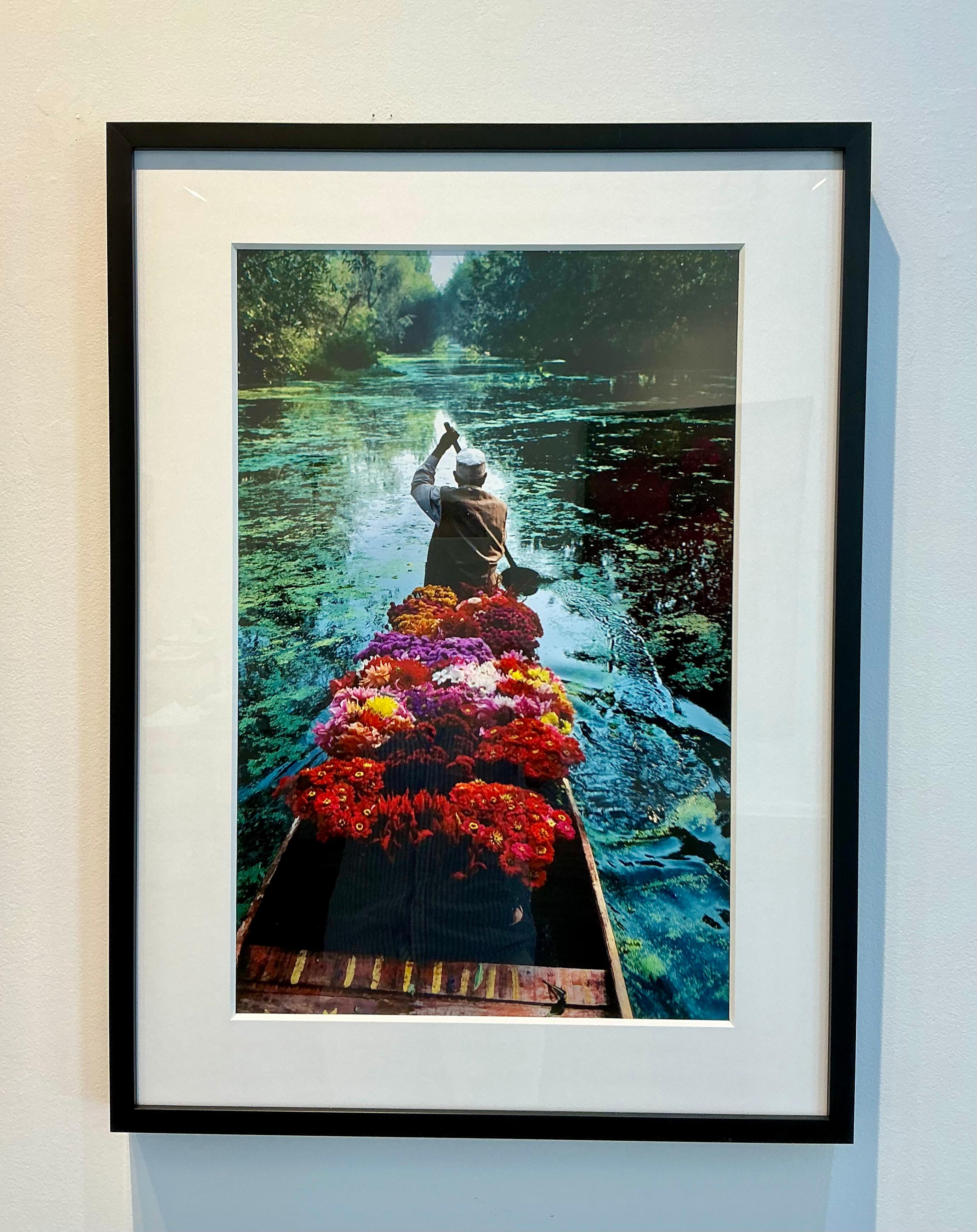 Kashmir Flower Seller, 1996 - Photograph by Steve McCurry