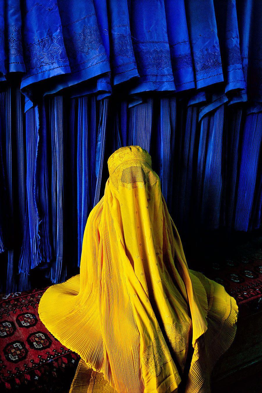 Woman in Canary Burqa - Photograph by Steve McCurry